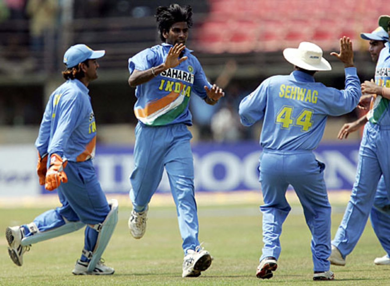 L Balaji is congratulated by his team-mates for dismissing Kamran Akmal, India v Pakistan, 1st ODI, Kochi, April 2, 2005