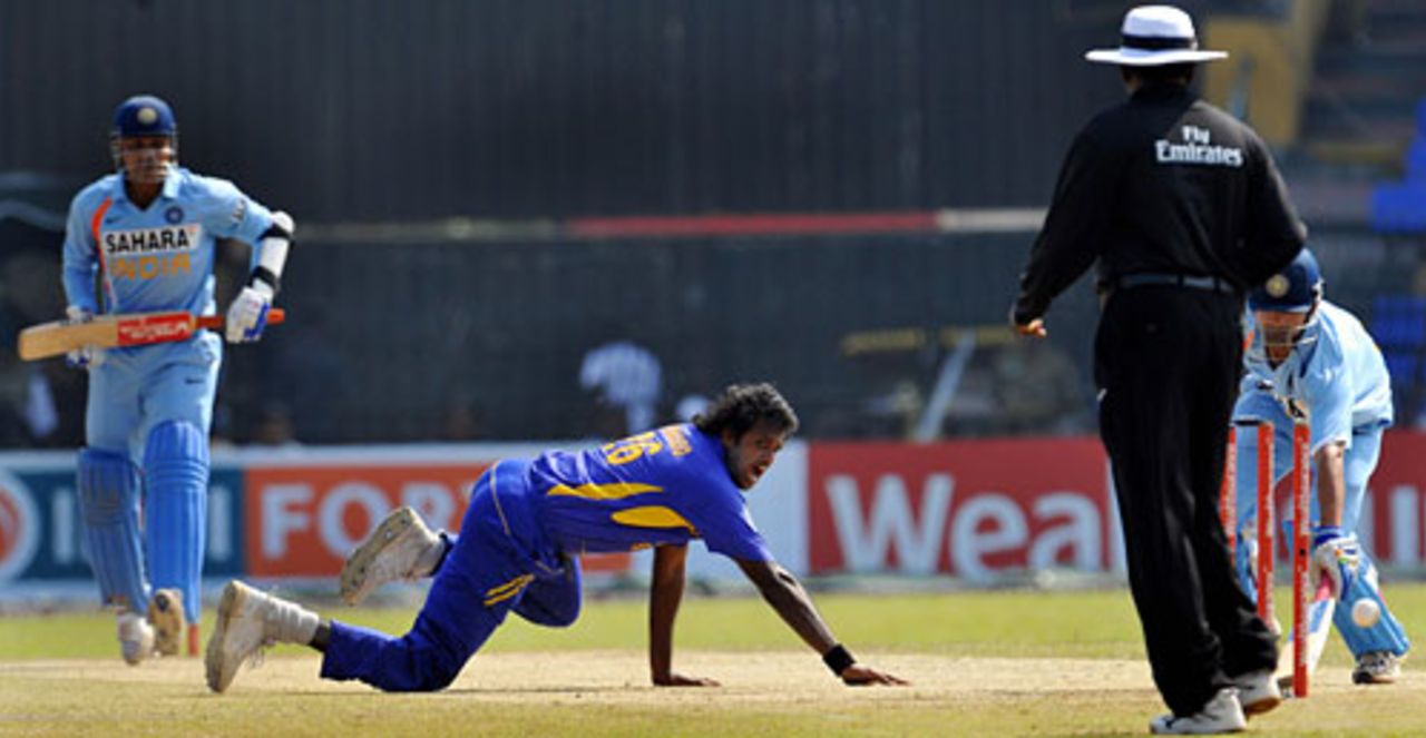 Gautam Gambhir is run out as the ball ricochets off Dilhara Fernando's fingers onto the stumps, Sri Lanka v India, 3rd ODI, Colombo, February 3, 2009