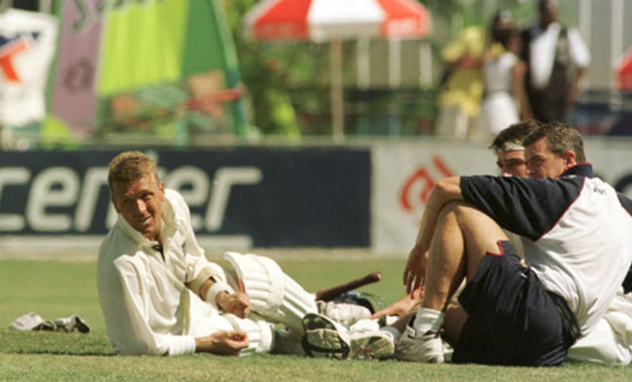 Alec Stewart and physio Wayne Morton wait for a decision shortly before the abandonment of the Test, West Indies v England, 1st Test, Jamaica, January 29, 1998