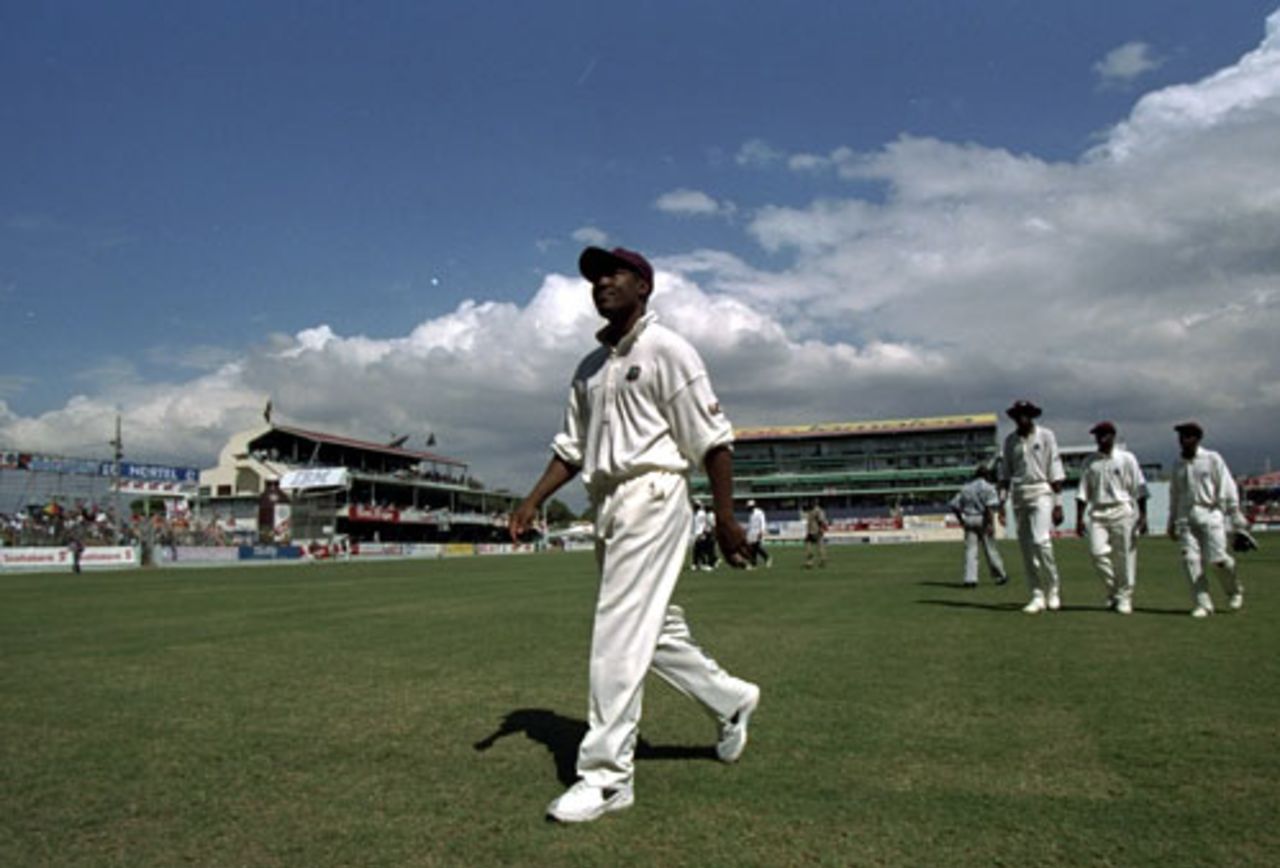 Brian Lara leads his team from the field shortly after the abandonment of the Test, West Indies v England, 1st Test, Jamaica, January 29, 1998