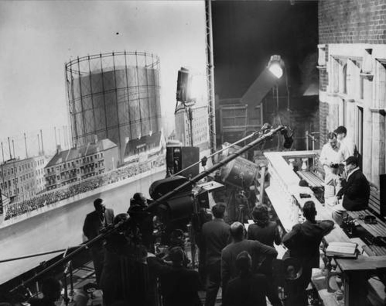 Len Hutton and actor Jack Warner on a film set of the balcony at The Oval in Pinewood Studio's during the filming of Terrence Rattigan's <i>The Final Test</i> 