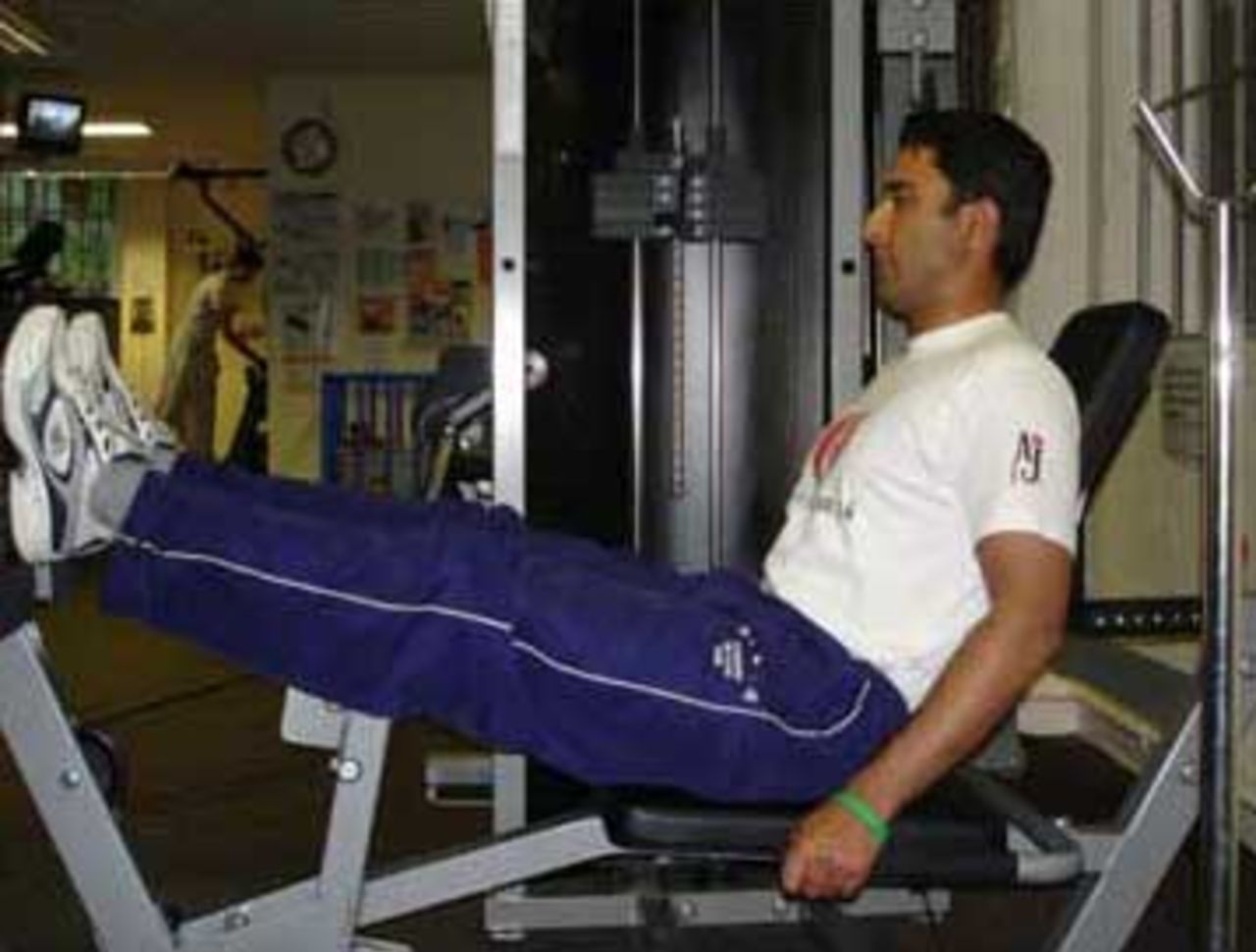 A trainee works out at the gym at the Rashid Latif Cricket Academy in Karachi