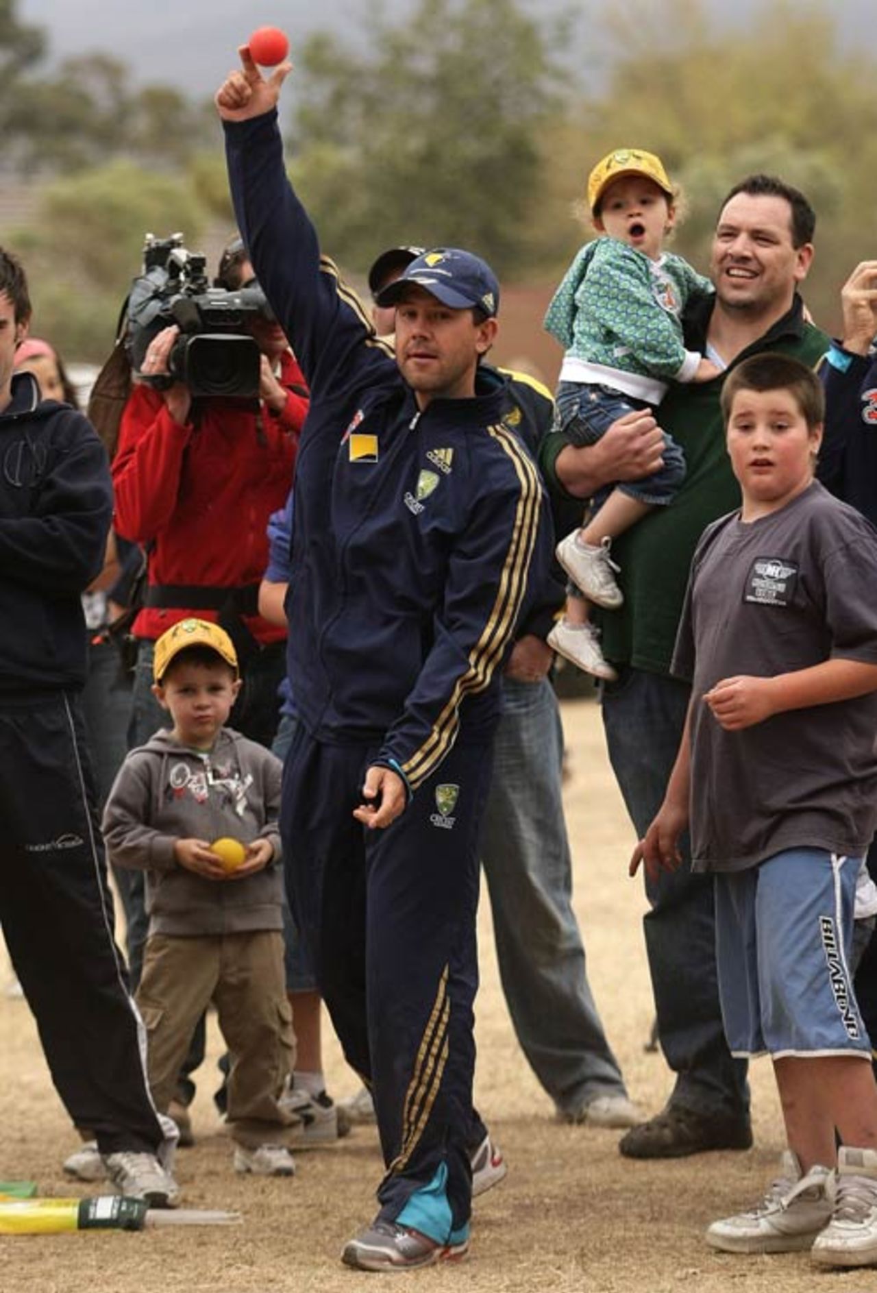 Ricky Ponting plays a game of cricket with bushfire victims in Whittlesea, February 11, 2009
