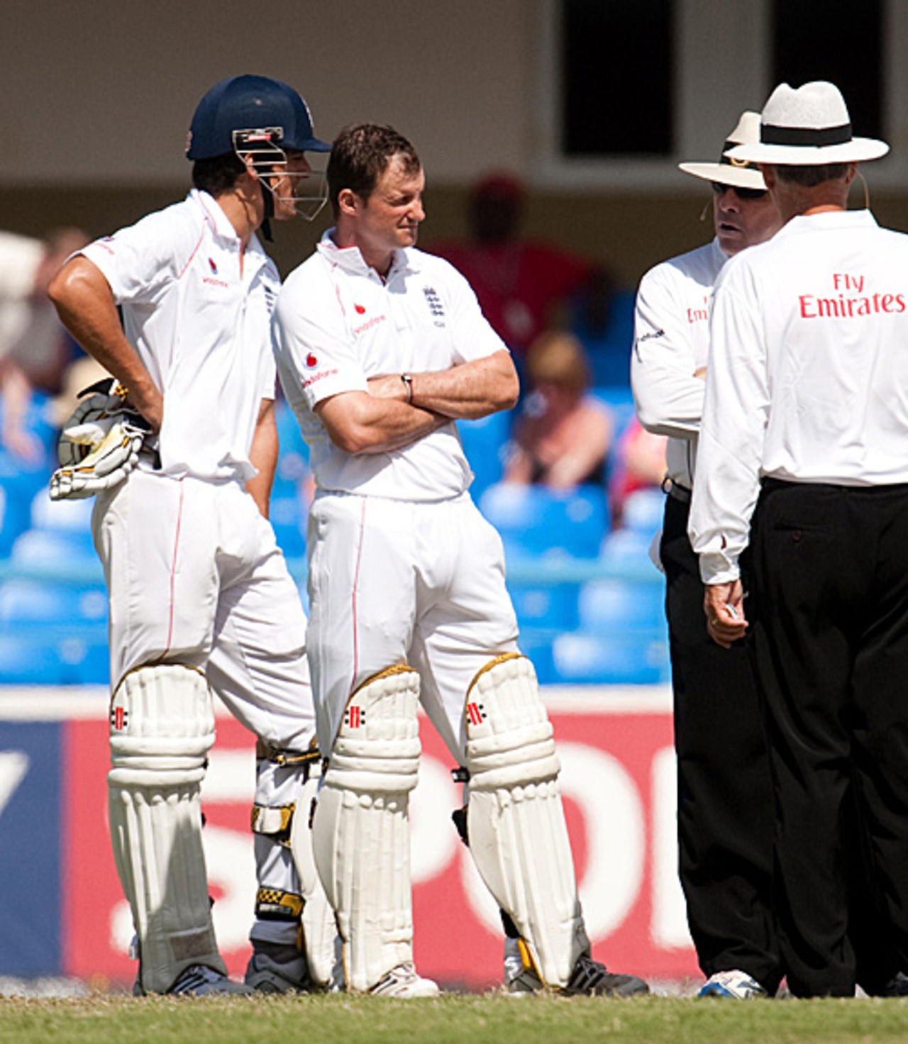 Alastair Cook and Andrew Strauss chat to the umpires and match referee shortly before play was abandoned for the day owing to a "dangerous" surface, West Indies v England, 2nd Test, St. Johns, Antigua, February 13, 2009
