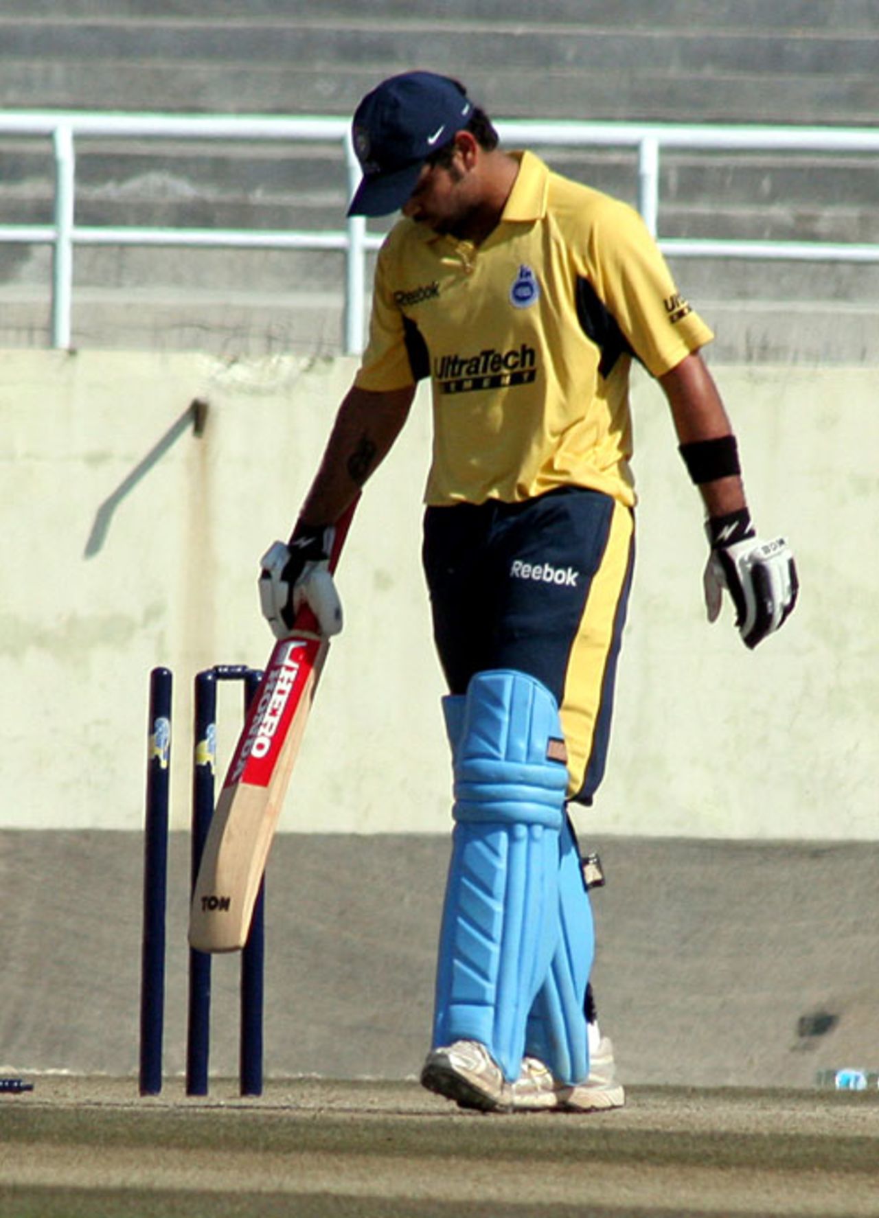 Virat Kohli walks back after being bowled, Jammu & Kashmir v Delhi, Ranji one-dayers, Dharamsala, February 15, 2009
