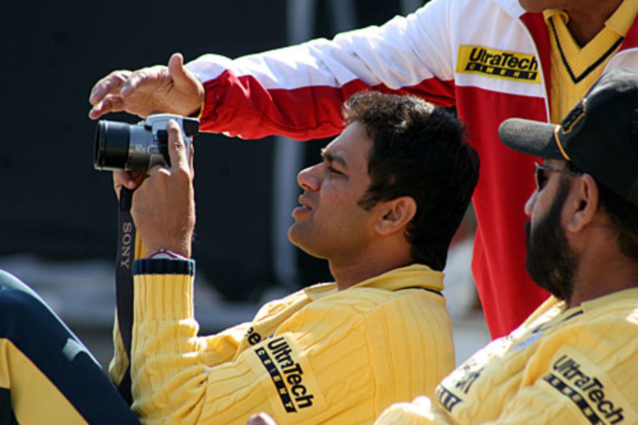 Aakash Chopra takes pictures during the match, Jammu & Kashmir v Delhi, Ranji one-dayers, Dharamsala, February 15, 2009