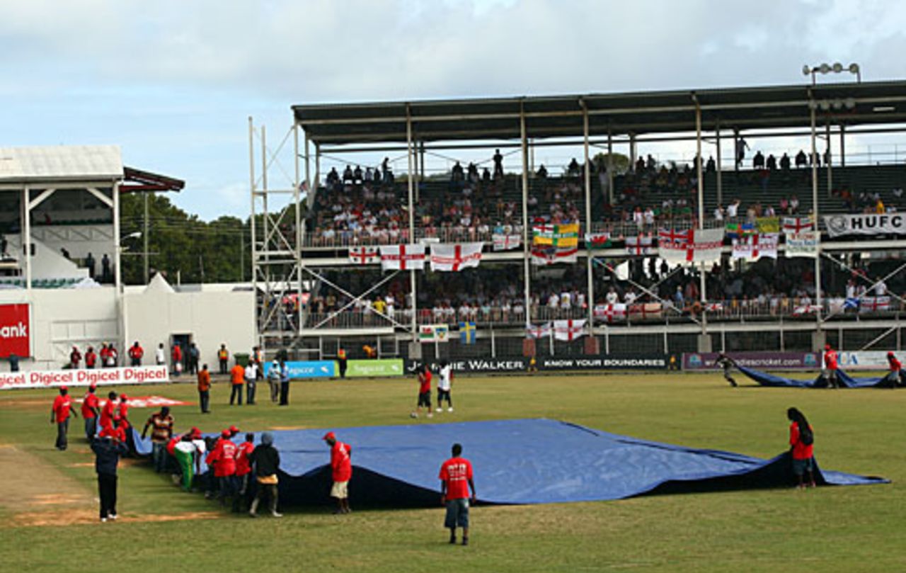 Groundsmen cover the wicket as rain falls, West Indies v England, 3rd Test, Antigua, 1st day, February 15, 2009