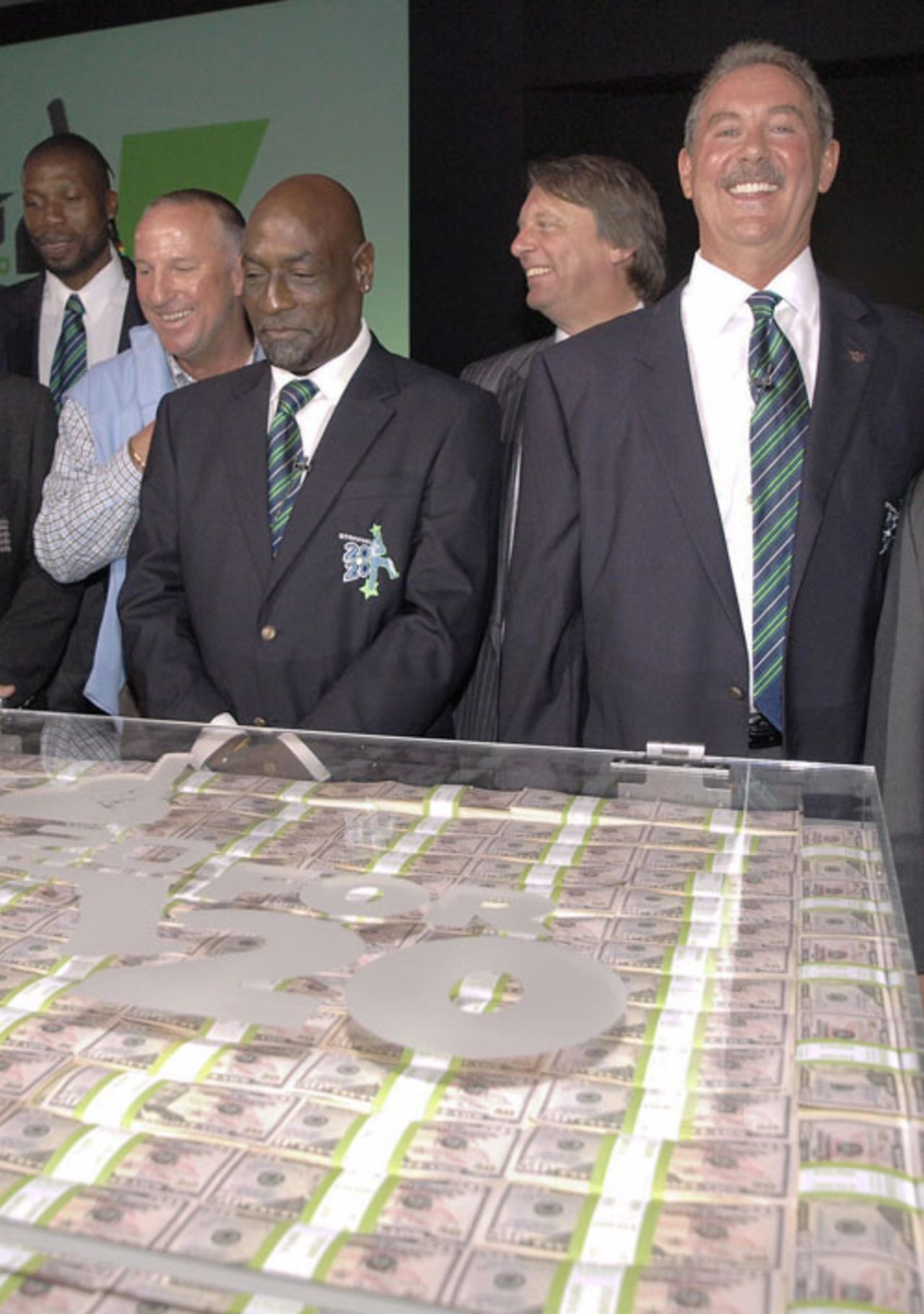 Allen Stanford poses with Sir Viv Richards and Sir Ian Botham in front of the US$20 million, Lord's, June 11, 2008