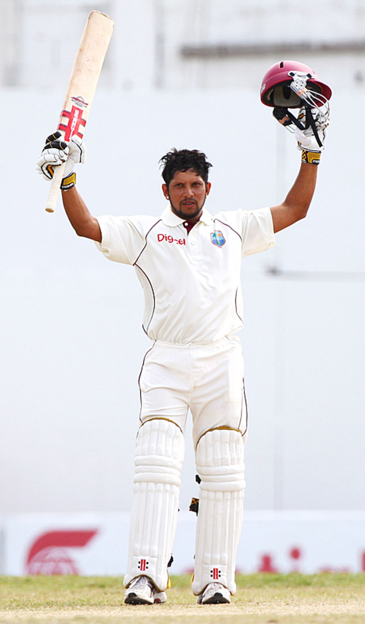 Ramnaresh Sarwan raises his bat after reaching his hundred, following his 94 in the first innings, West Indies v England, 3rd Test, Antigua, February 19, 2009