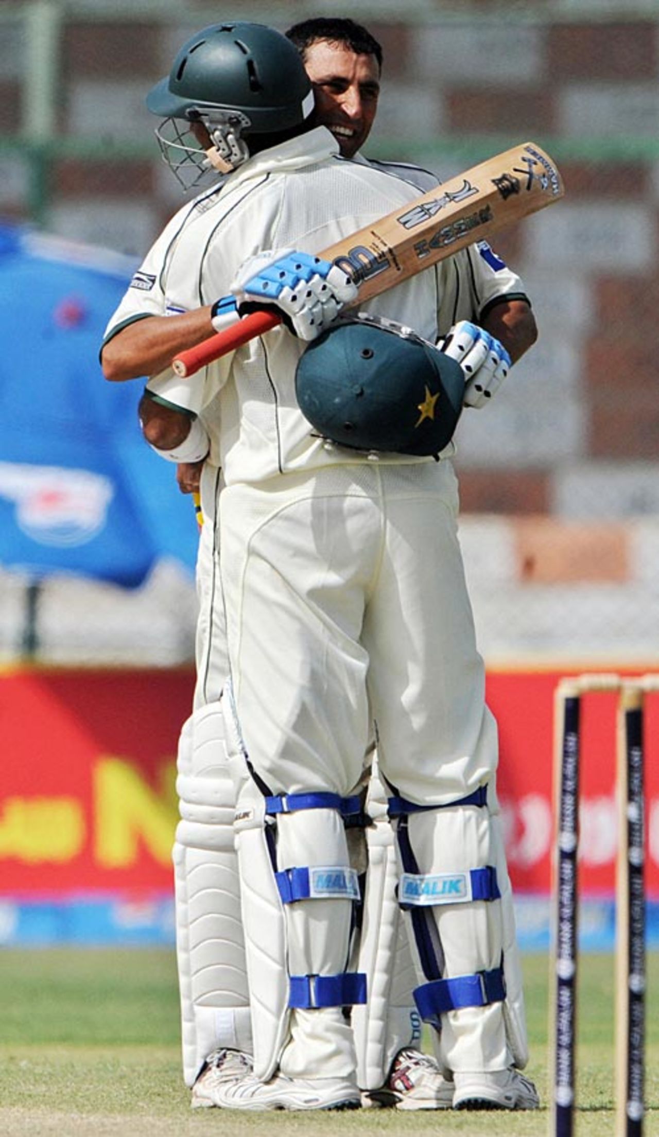 Younis Khan gets a hug from Shoaib Malik on completing his century, Pakistan v Sri Lanka, 1st Test, Karachi, 3rd day, February 23, 2009