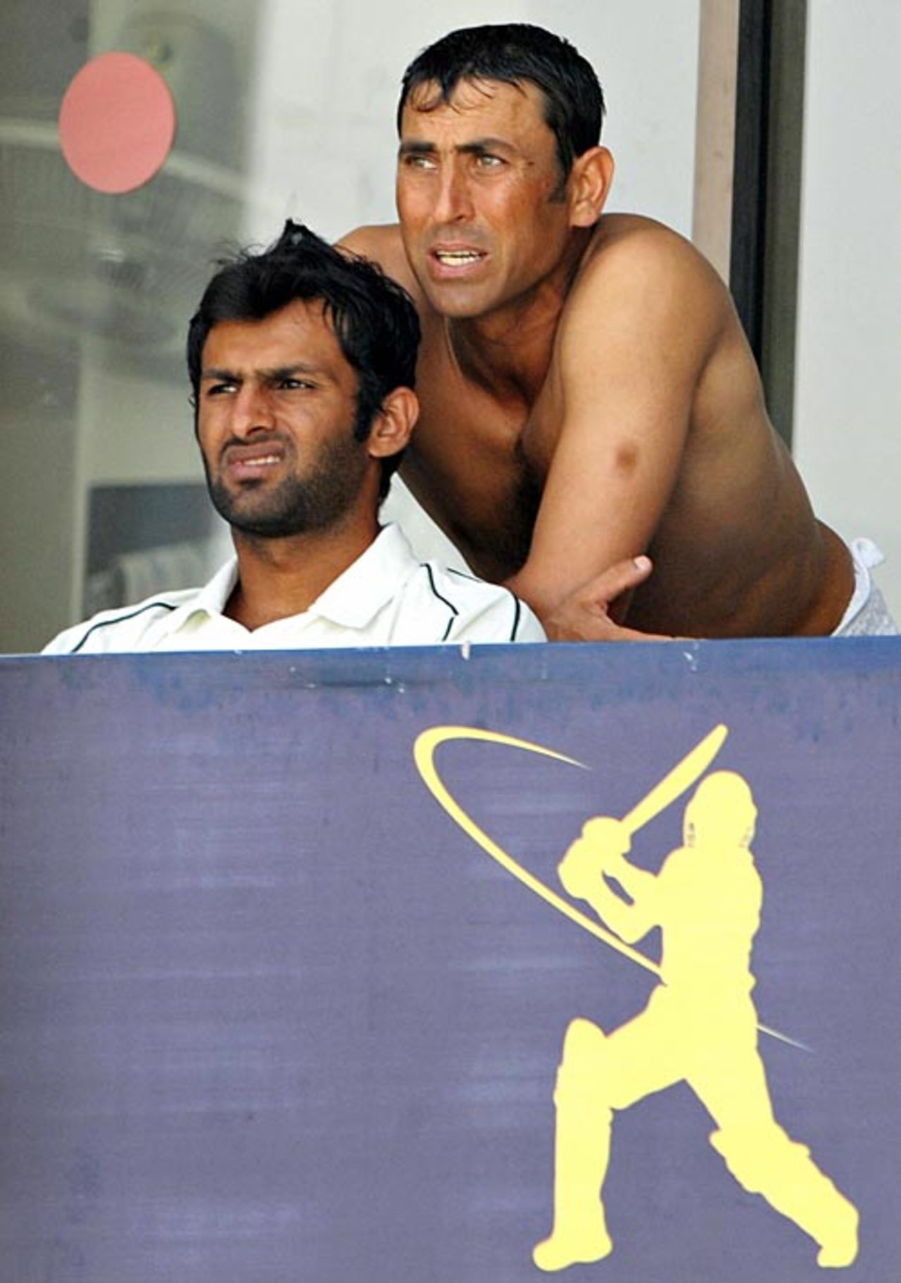 Younis Khan and Shoaib Malik view proceedings from the dressing room, Pakistan v Sri Lanka, 1st Test, Karachi, 5th day, February 25, 2009