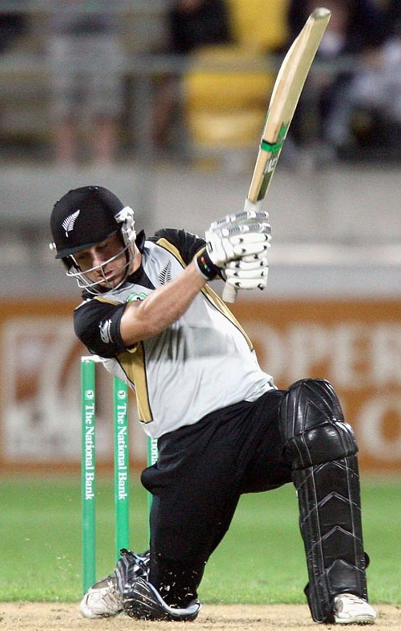 Nathan McCullum gets down on one knee to punch the ball through the off side, New Zealand v India, 2nd Twenty20 international, Wellington, February 27, 2009