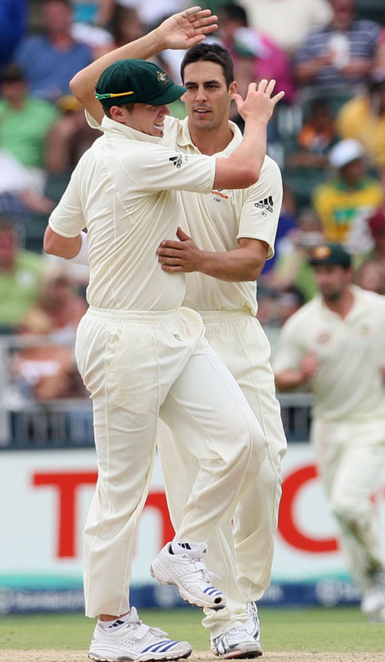 Mitchell Johnson and Peter Siddle celebrate the fall of Makhaya Ntini, South Africa v Australia, 1st Test, Johannesburg, 3rd day, February 28, 2009