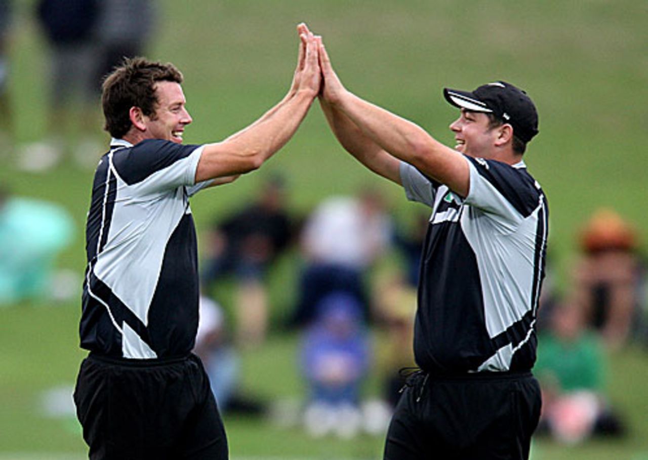 Ian Butler and Jesse Ryder celebrate a wicket, New Zealand v India, 1st ODI, Napier, March 3, 2009