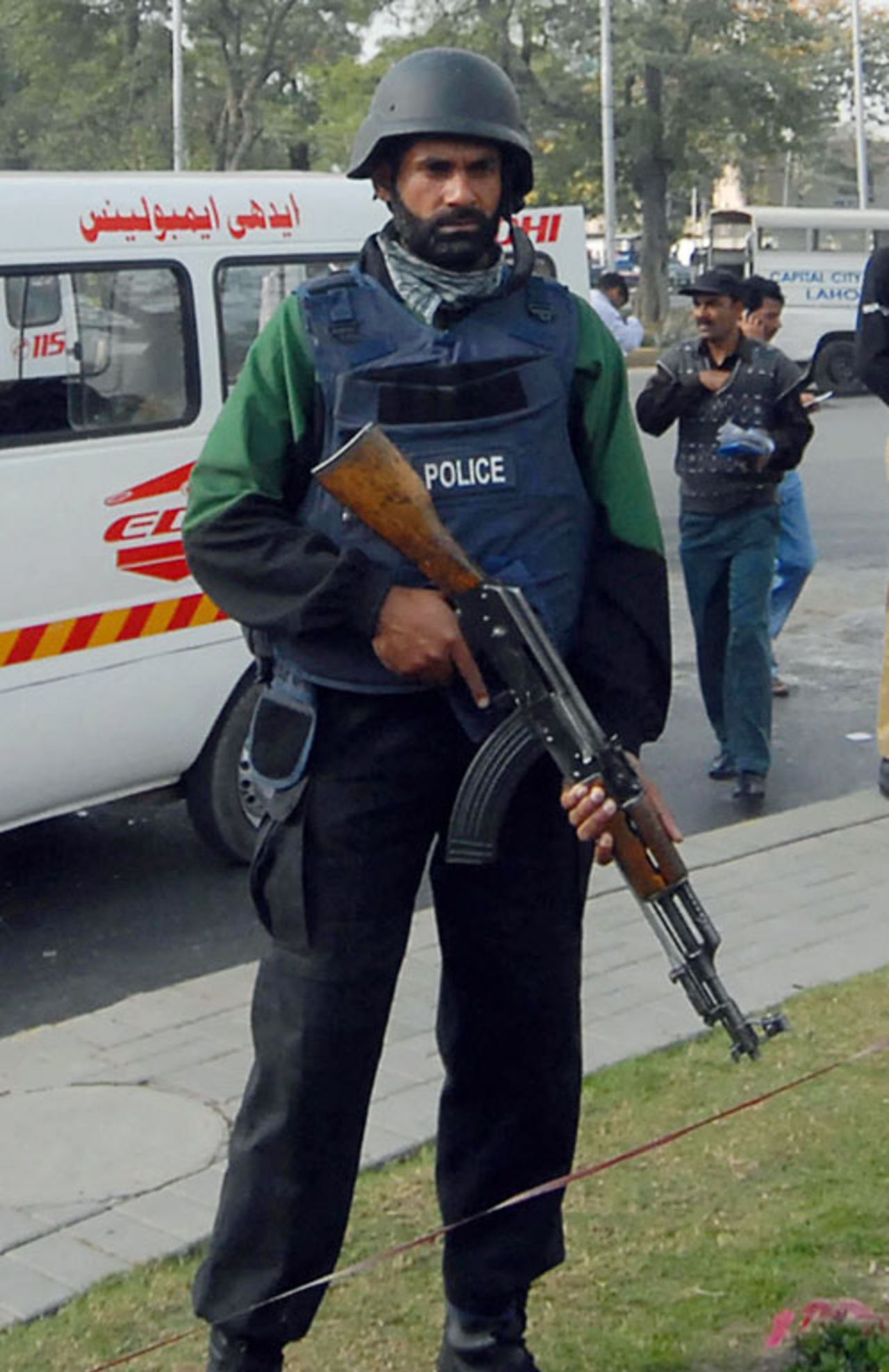 A security guard stands vigil after the firing in Lahore, Lahore, March 3, 2009