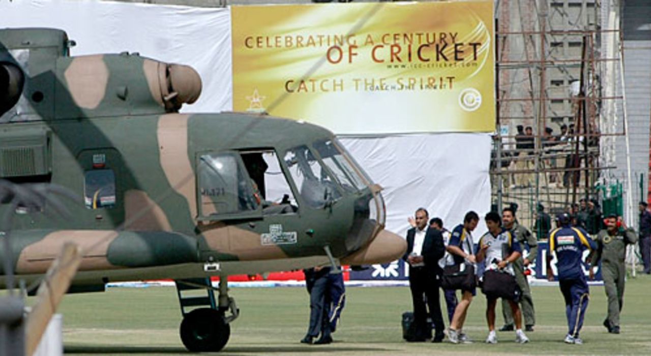 Sri Lankan players prepare to board a Pakistani military helicopter at the National Stadium in Lahore following the terrorist attack, Lahore, March 3, 2009