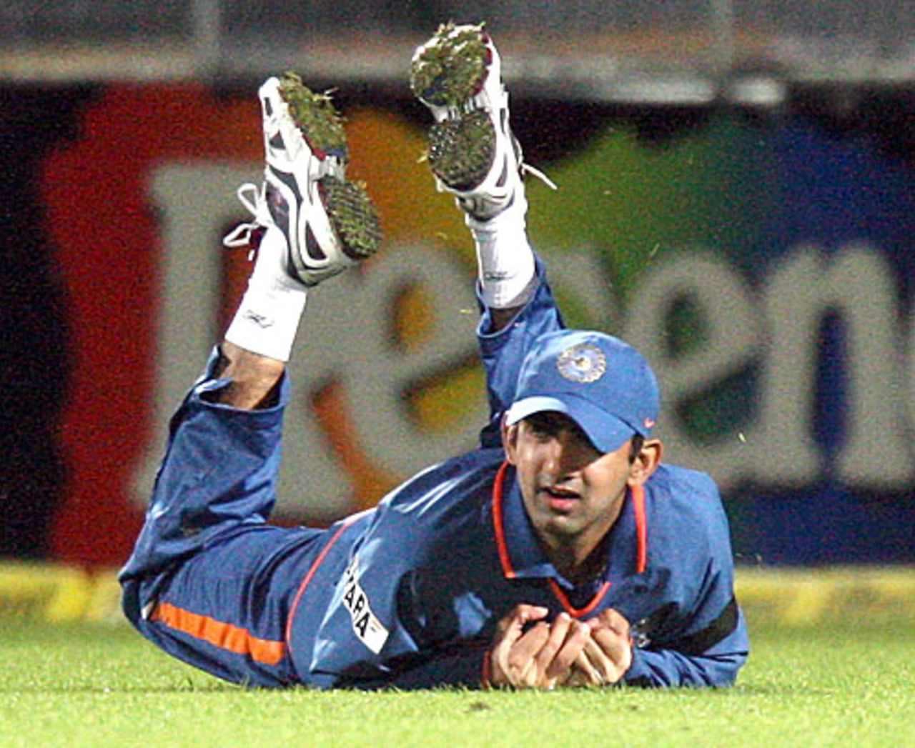 Gautam Gambhir falls forward after hanging onto a skier, New Zealand v India, 1st ODI, Napier, March 3, 2009