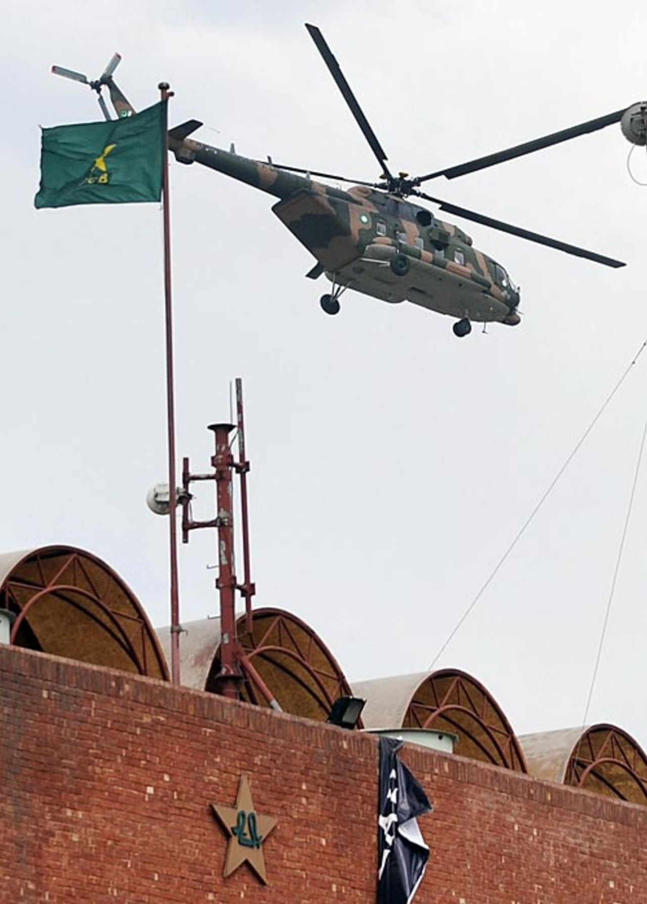 A chopper flies over the Gaddafi Stadium, Lahore, March 3, 2009