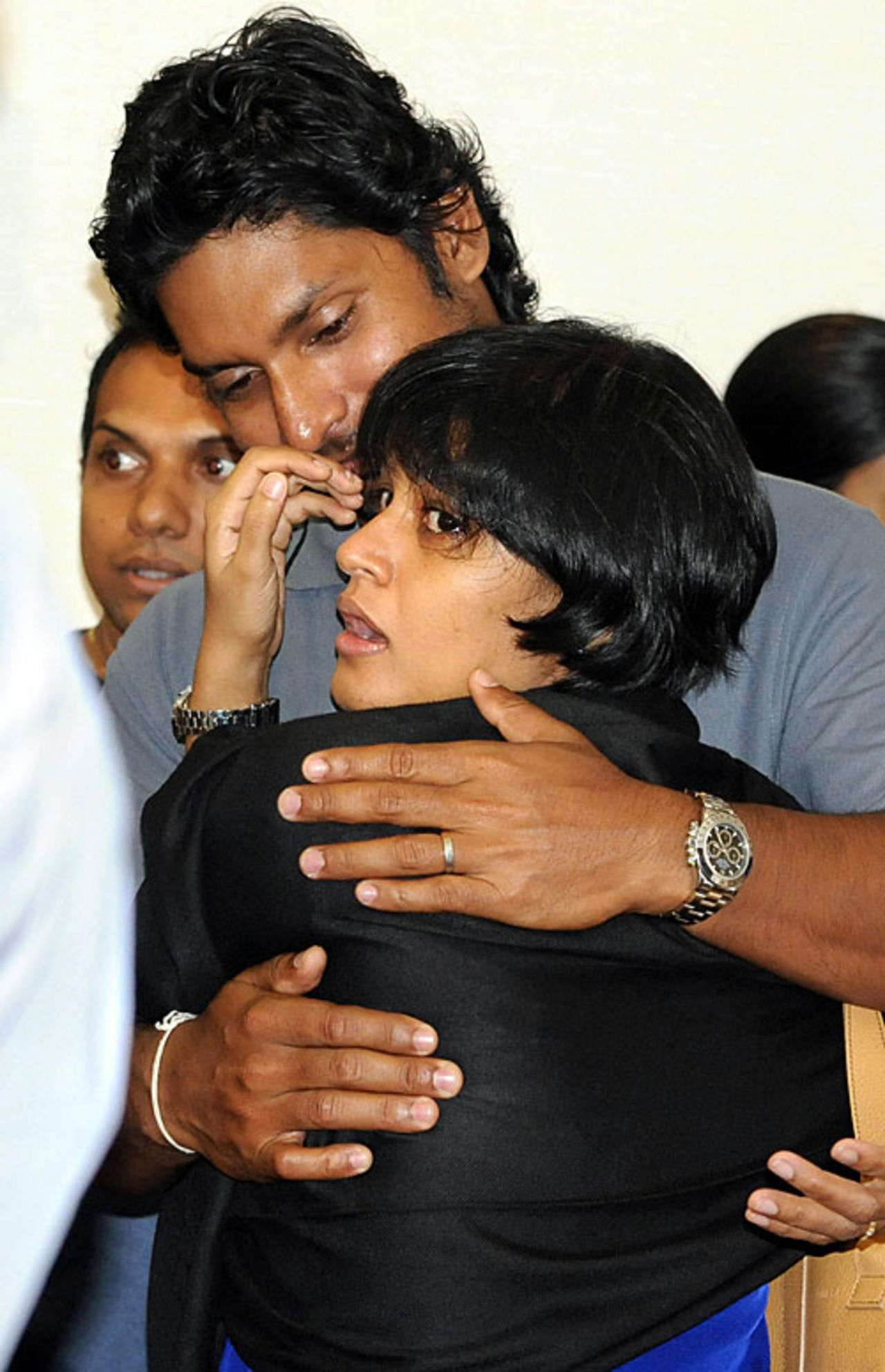 Kumar Sangakkara comforts his wife Yehali, Colombo, March 3, 2009