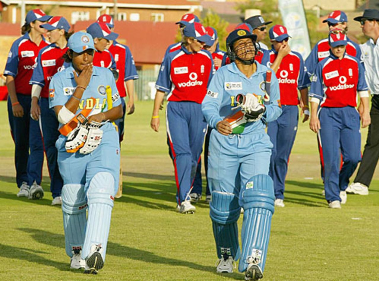 Anjum Chopra and Rumeli Dhar walk back after a win against England, England v India, Pretoria, March 28, 2005