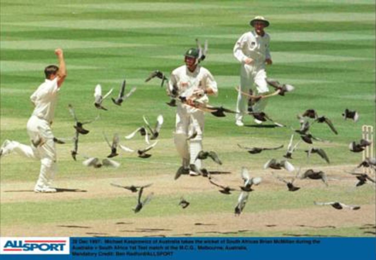28th December 1997 Australia v South Africa Test 1,  Kasprowicz celebrates the dismissal of McMillan amongst a flock of pigeons..
