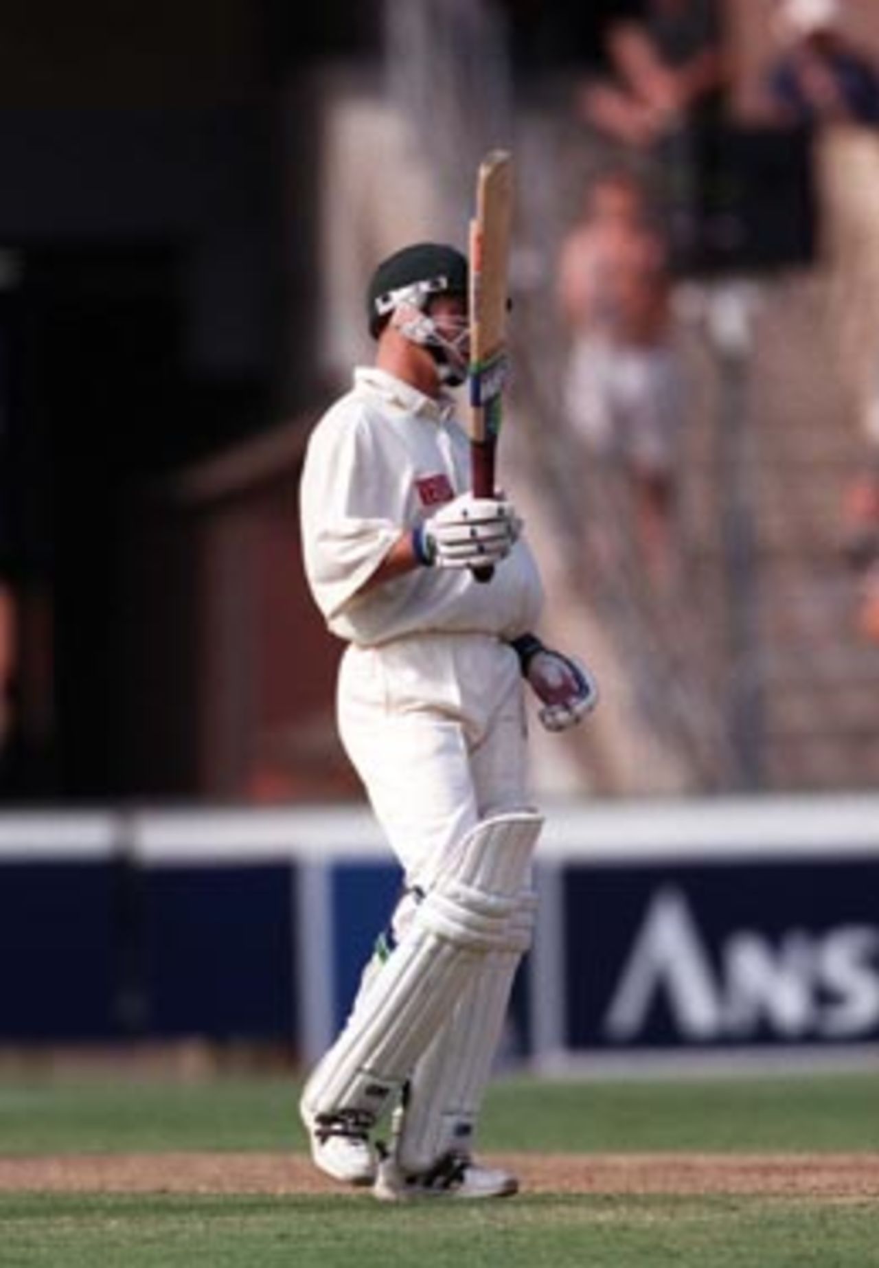 Herschelle Gibbs raises his bat momentarily on reaching his maiden half century in Tests ...Australia v South Africa, Day 1, 2nd Test, Friday January 2nd 1998.