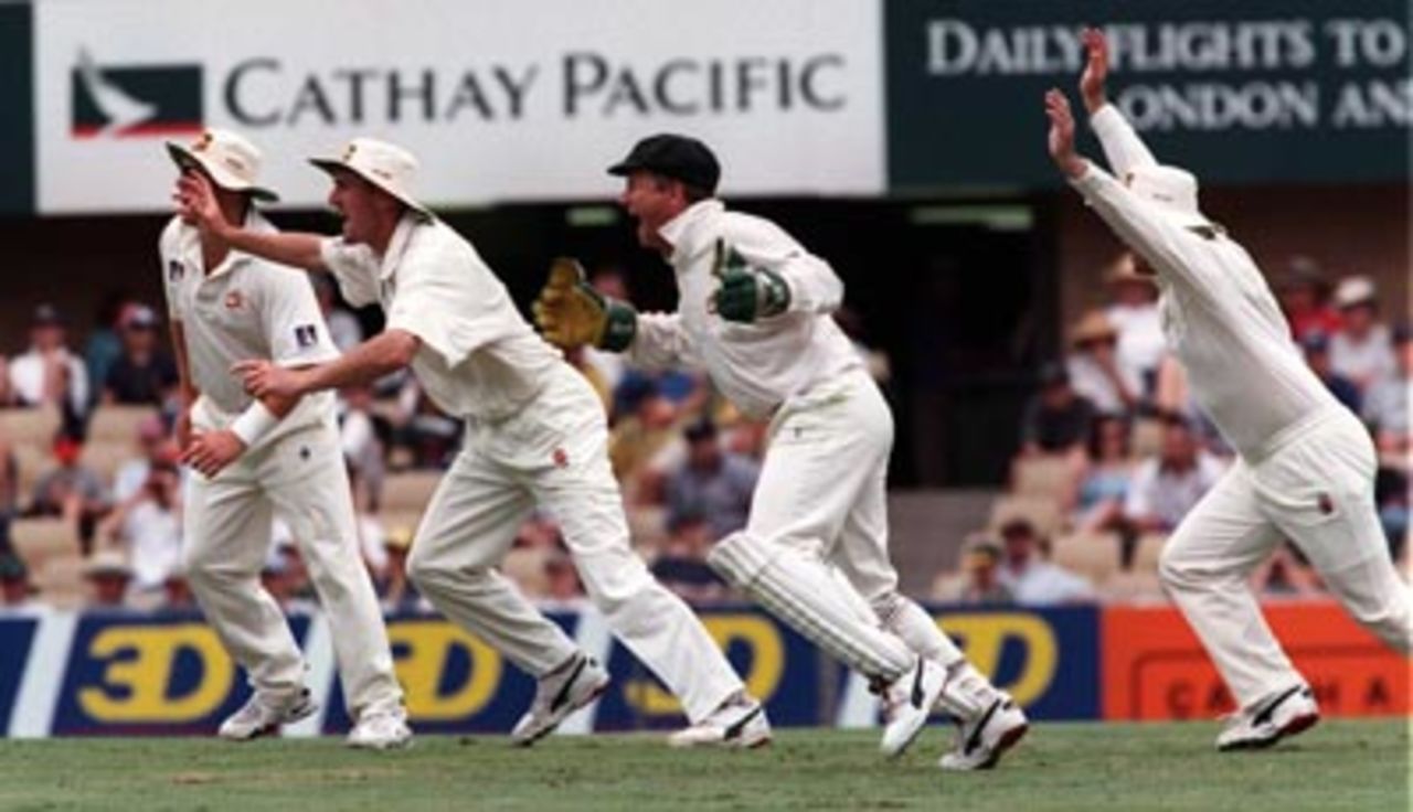 Ready set go...the Australia slips cordon races to congratulate Paul Reiffel after he trapped Bacher in front..Australia v South Africa, 2nd Test Day 4 at the SCG, Monday January 5th 1998.