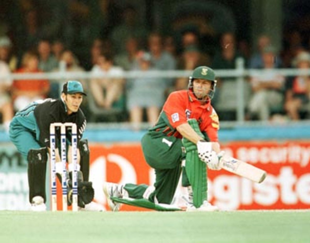 Gary Kirsten sweeps for 4 on his way to his century ...South Africa v New Zealand ODI at the 'Gabba, Brisbane, Friday January 9th 1998.