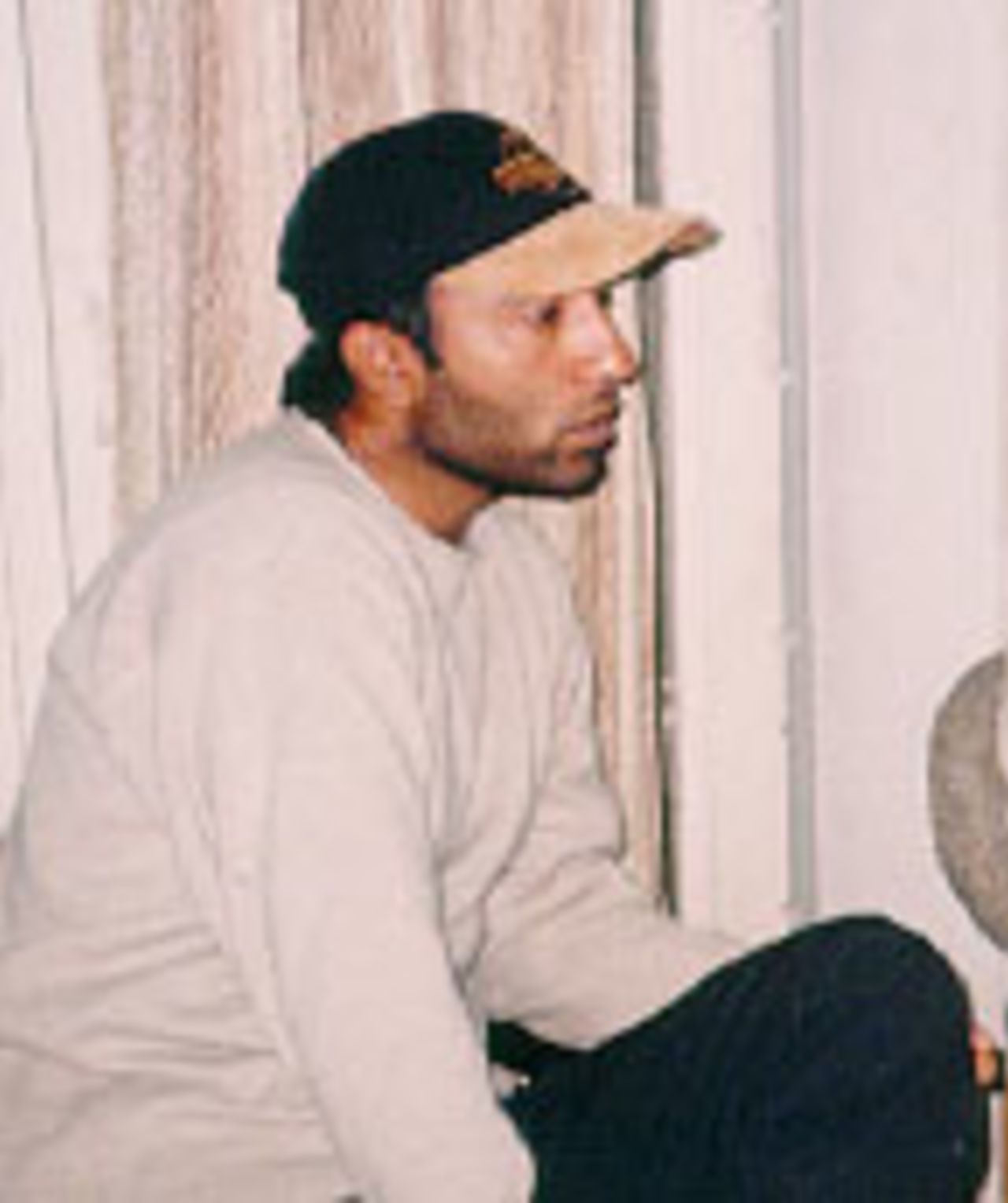 Saeed Anwar watching attentively as he is interviewed via IRC for CricInfo