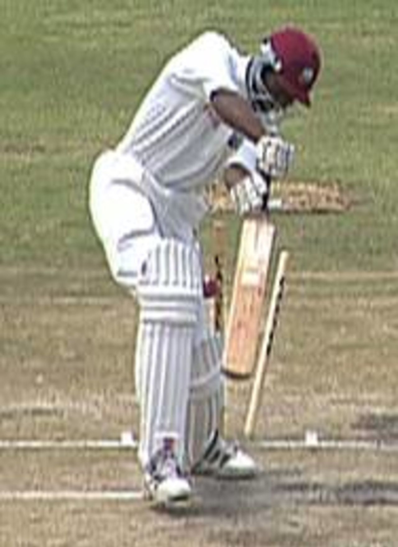 West Indies A paceman Nixon McLean is bowled by South Africa A's Mornantau Hayward for 2 during the second "Test" at Buffalo Park, East London, 19-22 Dec 1997.