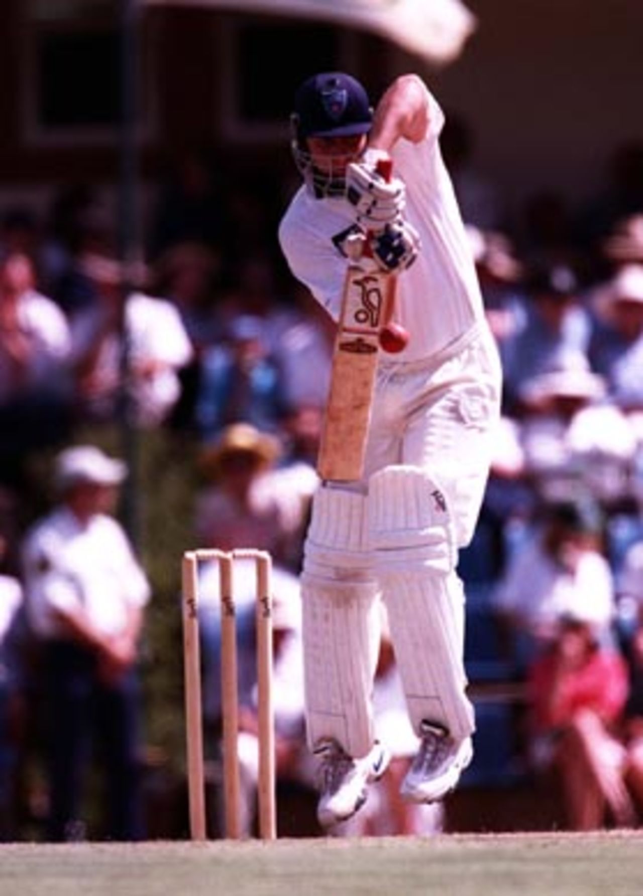 Shane Lee jumps high to defend ...Bradman XI v South Africans at Bradman Oval, Bowral, Tuesday January 13th 1998.