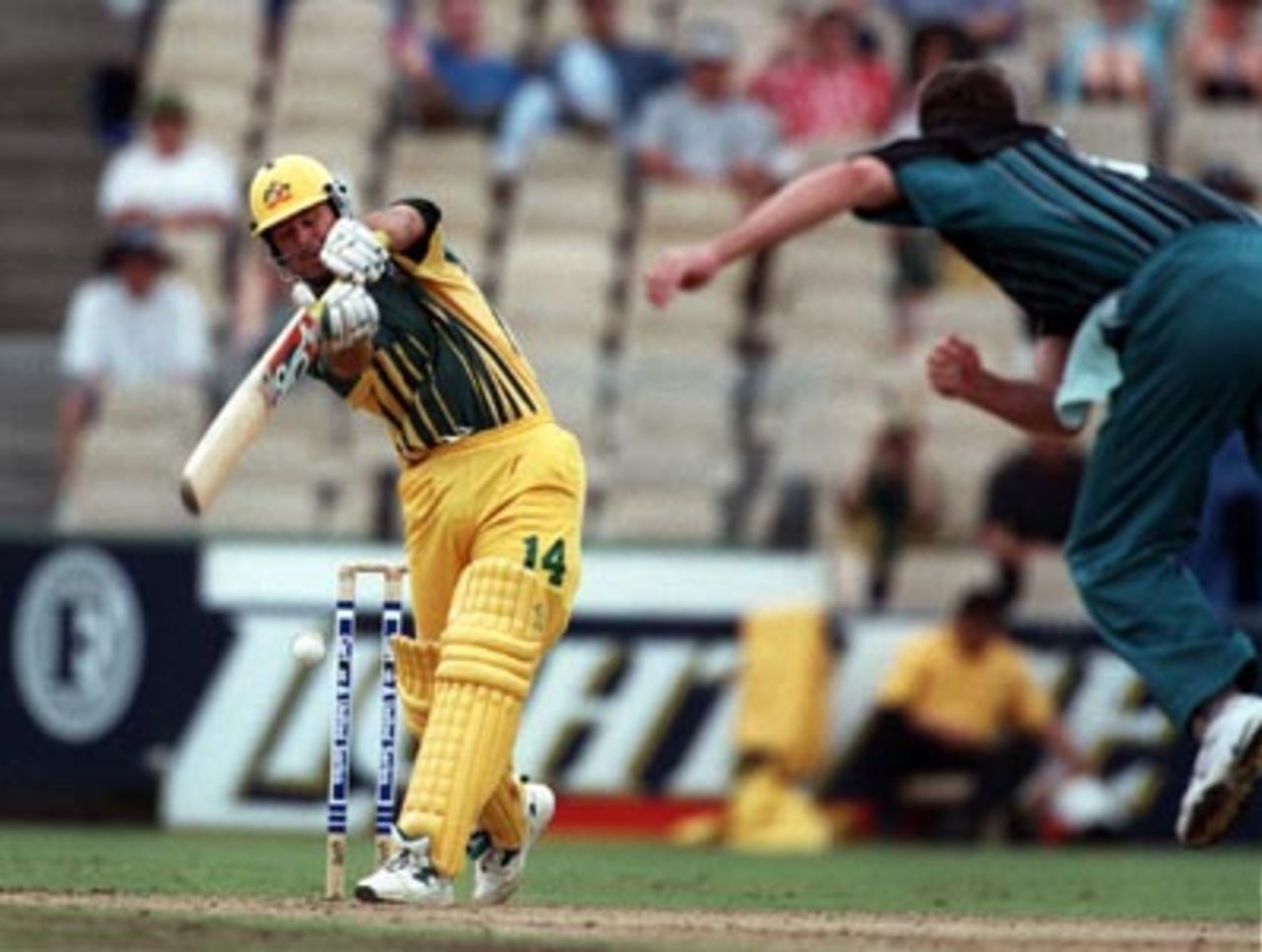 Ricky Ponting, eyes closed, drives Chris Cairns...Australia v New Zealand ODI at the Sydney Cricket Ground, Wednesday January 14th 1998.
