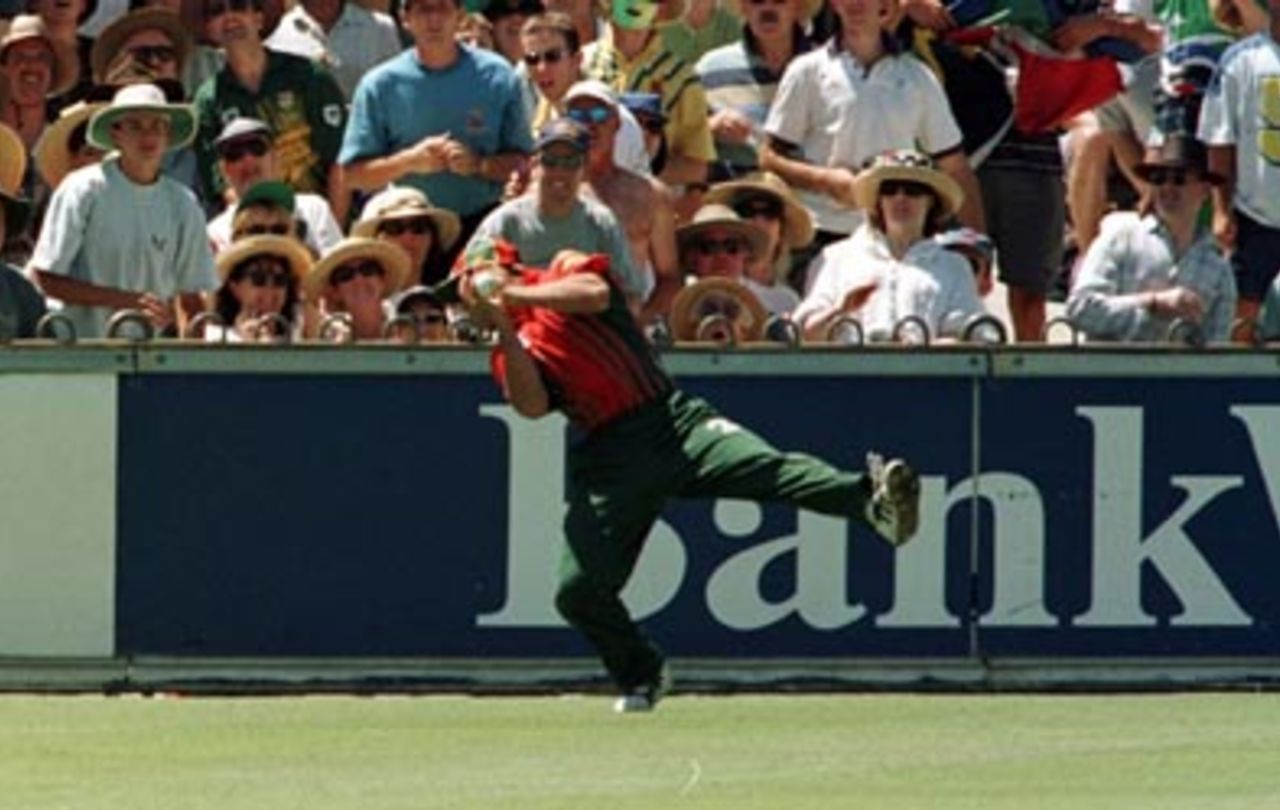 Jacques Kallis looks back for the fence as he catches Ricky Ponting off Pat Symcox ...Australia v South Africa d/n ODI at the WACA Ground, Perth, Sunday January 18th 1998.