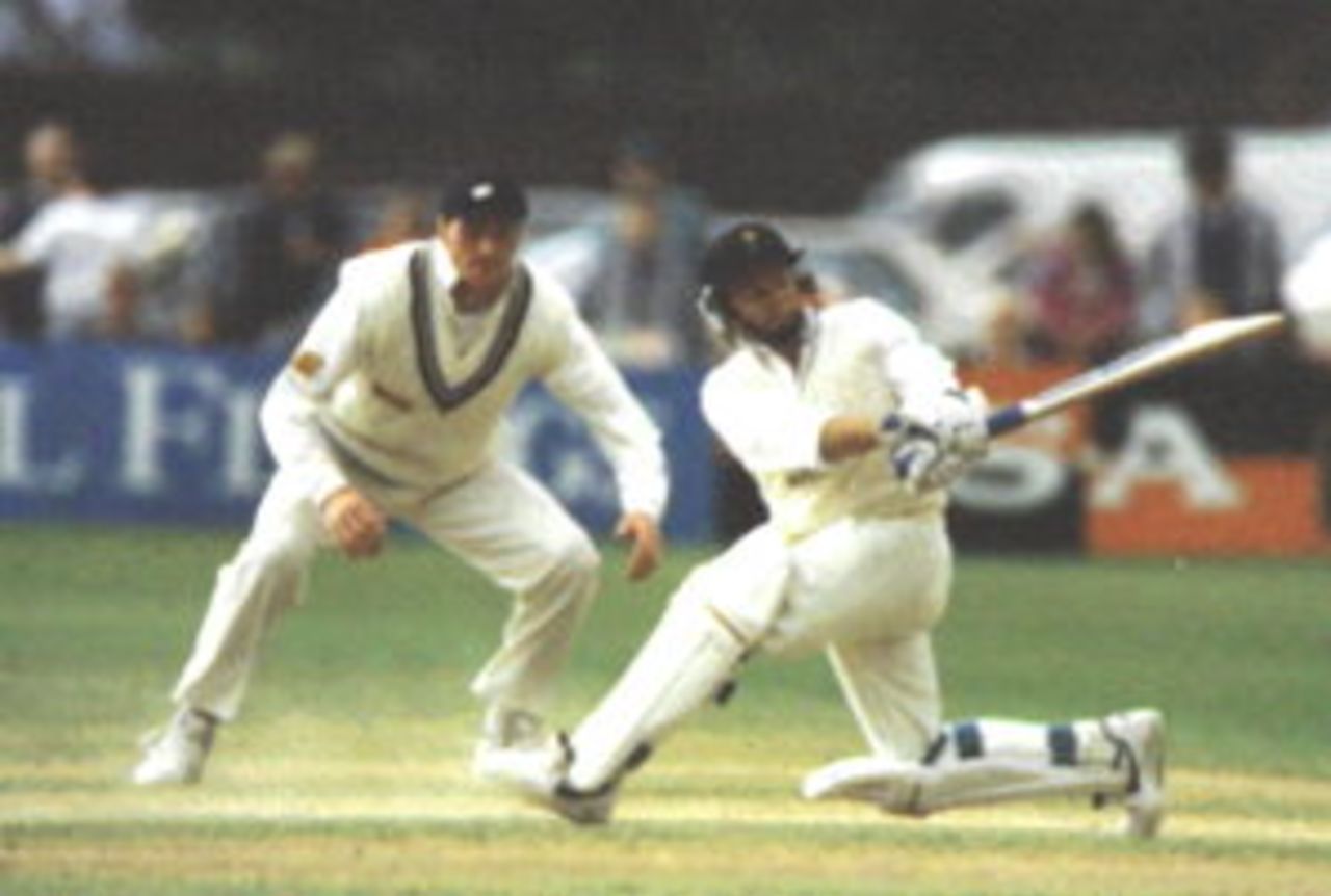Tony Cottey sweeps Richard Stemp during Glamorgan`s match with Yorkshire at Cardiff in 1996, watched by Yorkshire captain David Byas.