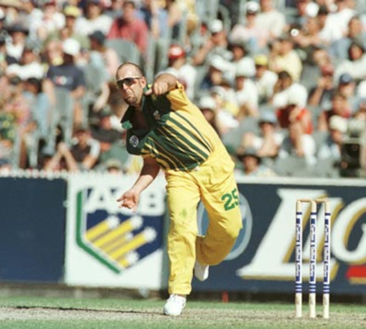 Darren Lehmann bowls during the 1st Final of the CUB One-Day Series at the Melbourne Cricket Ground. January 23rd 1998.