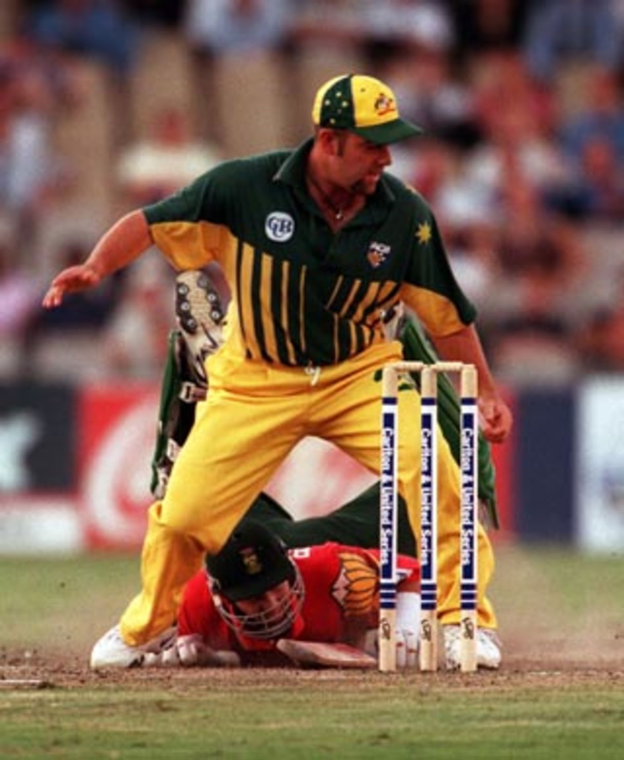 Adam Bacher gets back to his crease through Darren Lehmann's legs... Australia v South Africa 3rd and deciding ODI Final, Sydney Cricket Ground, Tuesday 27th January 1998.