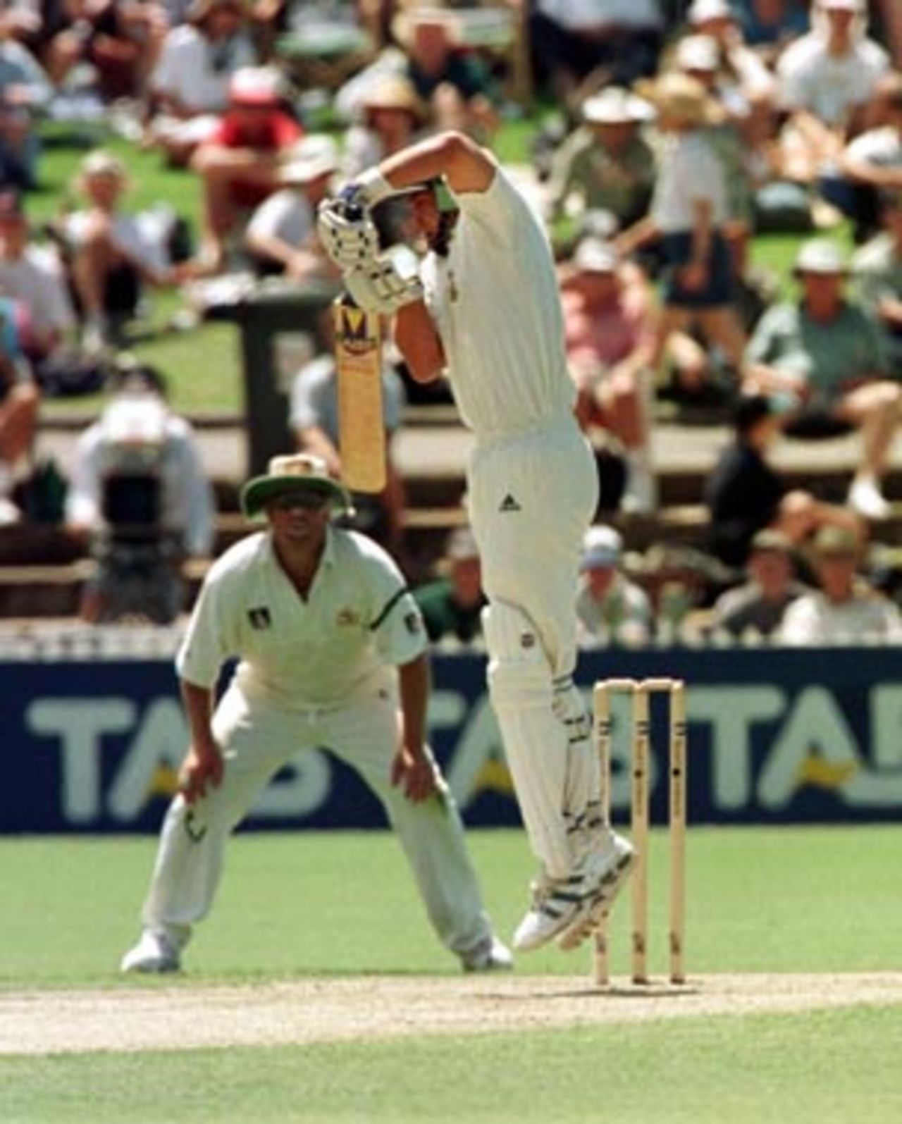 Jacques Kallis up high defending ..Australia v South Africa 3rd Test, Day 1 at the Adelaide Oval, Friday January 30th 1998.