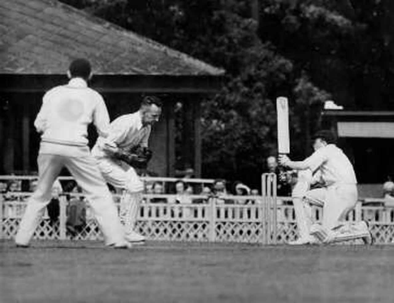 Willie Jones sweeping against Essex at Ilford in 1949