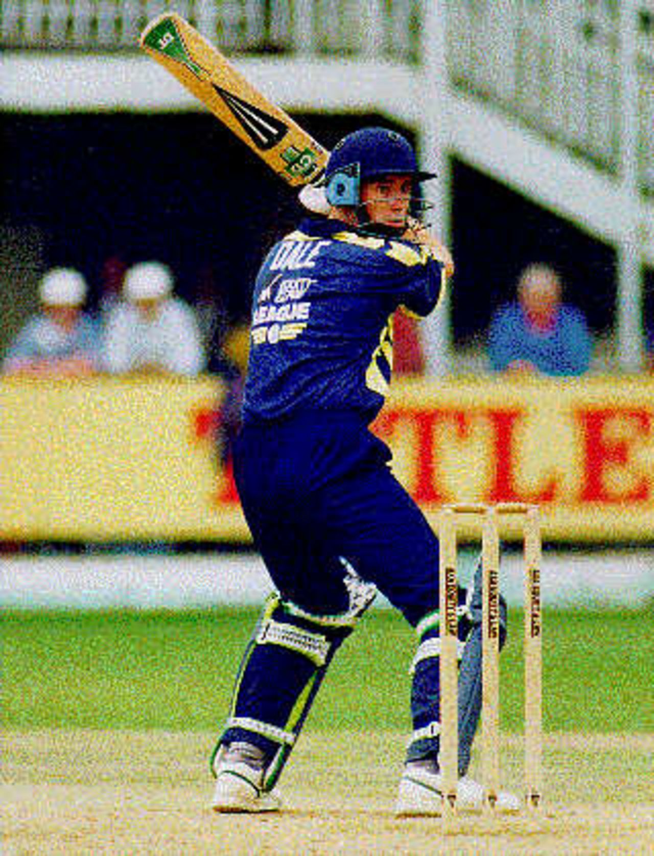 Adrian Dale cutting the ball to the boundary against Surrey in the 1994 Sunday League match at Swansea.