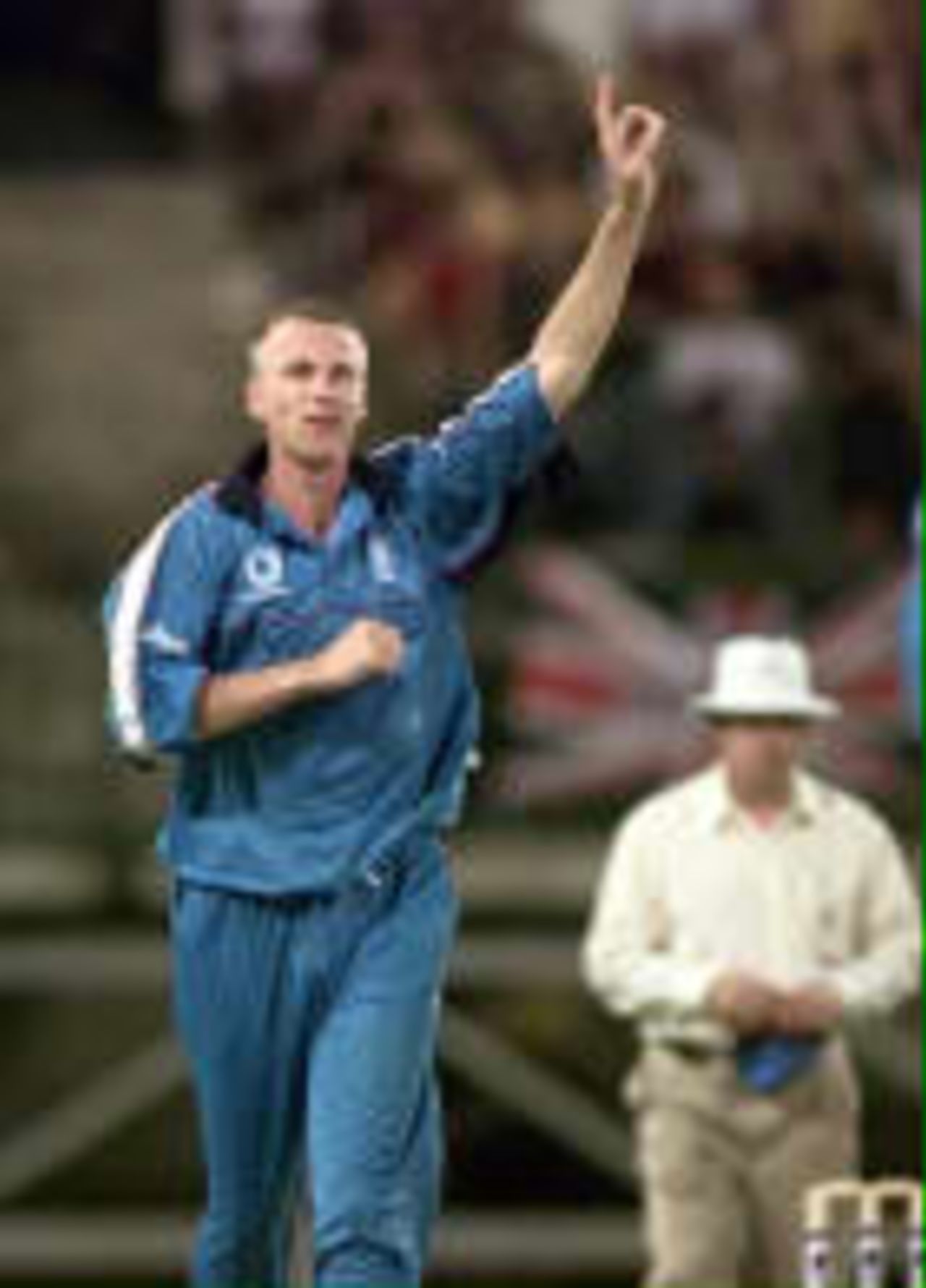 Alan Mullally celebrates after dismissing Adam Gilchrist for thirteen - Carlton & United One-Day Series, 1998-99, 1st Match Australia v England Brisbane Cricket Ground, Woolloongabba, Brisbane (day/night) 10 January 1999 (50-over match)
