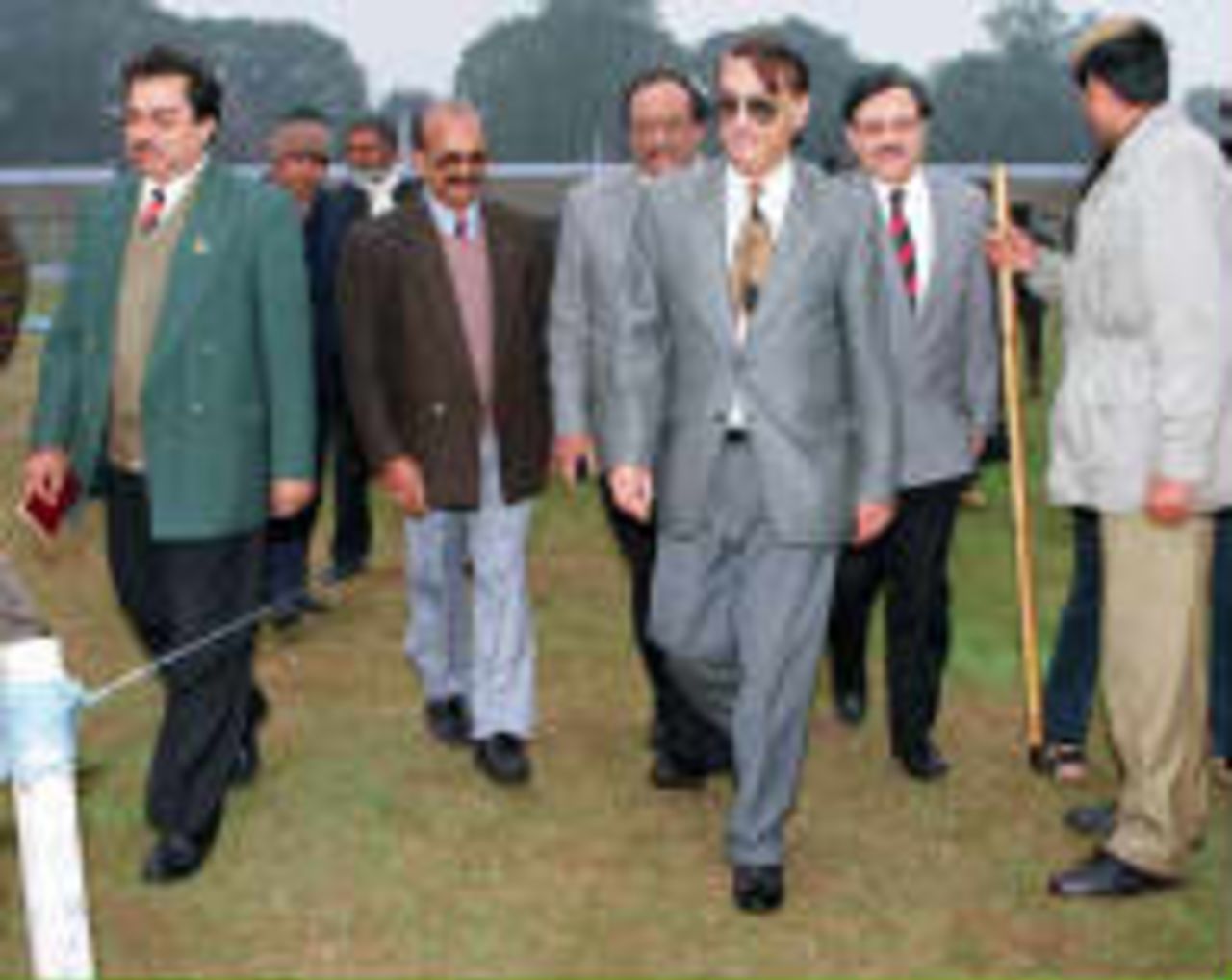 PCB special envoy Brigadier Saeed Raffi walks with members of the Indian Cricket Board at Ferozeshah Kotila Stadium, New Delhi 13 January. The Brigadier is in the centre of the picture