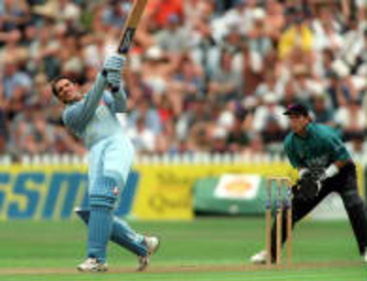 Mohammad Azhauruddin hits a 6, watched by Adam Parore - India in New Zealand, 1998/99, 3rd One-Day International - abandonded New Zealand v India Basin Reserve, Wellington 14 January 1999