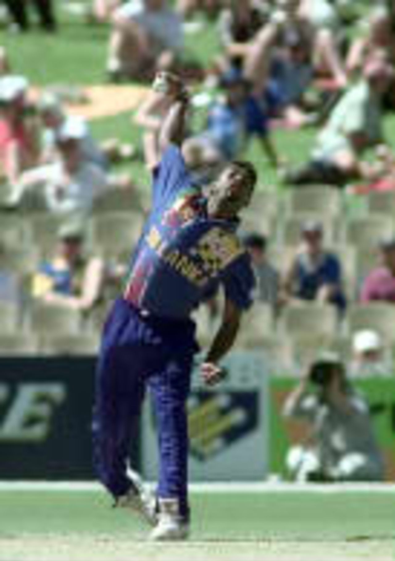 Muttiah Muralitharan bowls during his controversial spell - Muralitharan was no-balled by umpire Emerson for throwing, provoking captain Ranatunga to lead his players off the field/ - Carlton & United One-Day Series, 1998-99, 8th Match England v Sri Lanka Adelaide Oval, Adelaide, South Australia (day/night) 23 January 1999