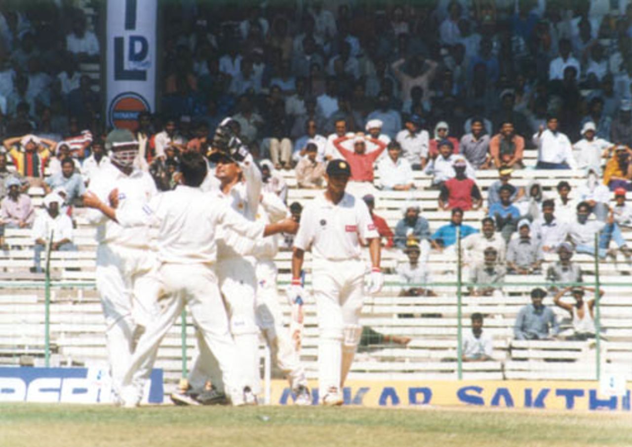 Rahul Dravid is dismissed lbw by Saqlain Mushtaq, as Saqlain runs through the Indian middle order. India v Pakistan, Test 1, Day 2 at Chennai, 29 January 1999