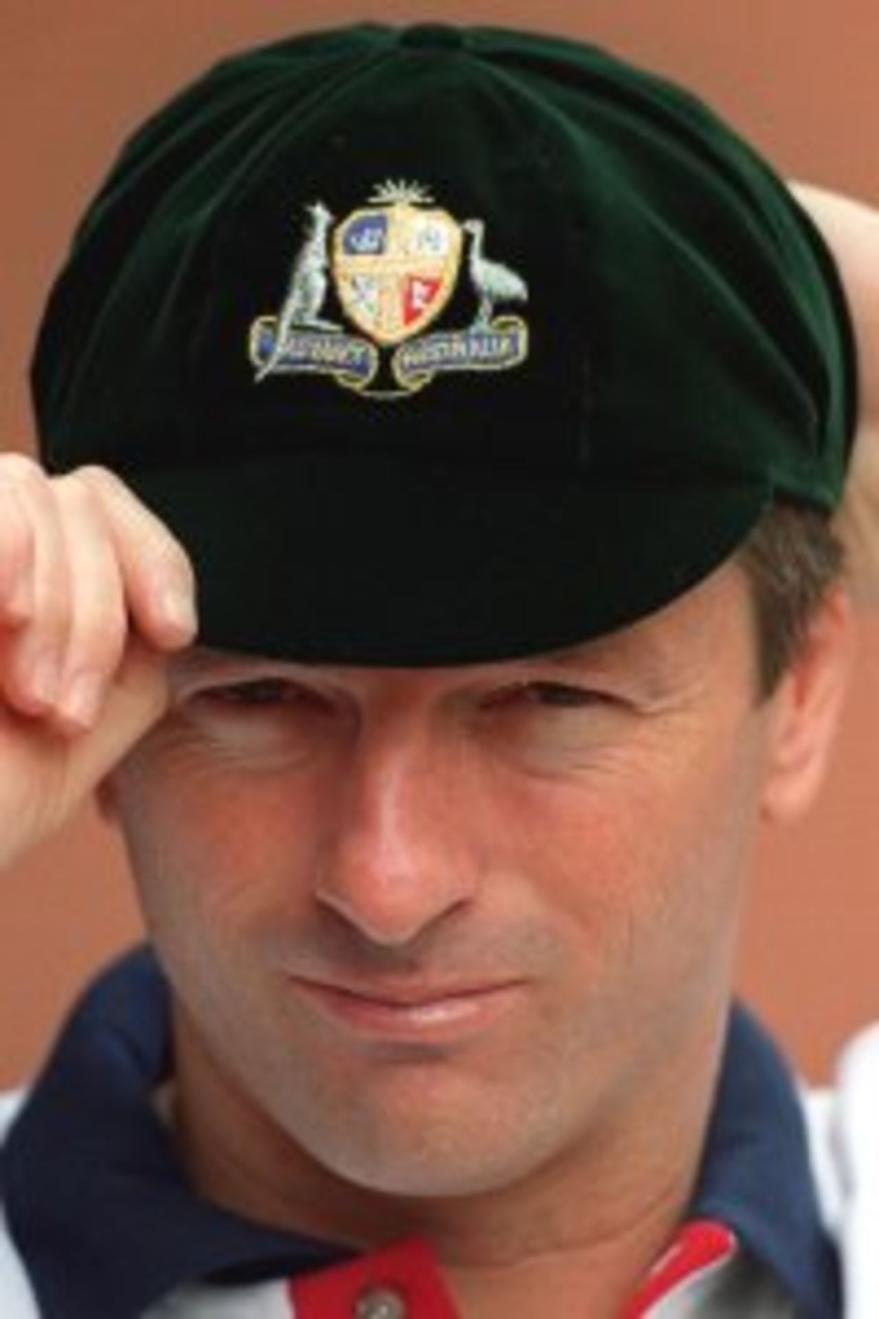 1 Jan 2000: Captain of Australia Steve Waugh tries on the 100 hundred year old style replica cricket cap to be worn in the Third Test match against India at the Sydney Cricket Ground, Sydney, Australia.