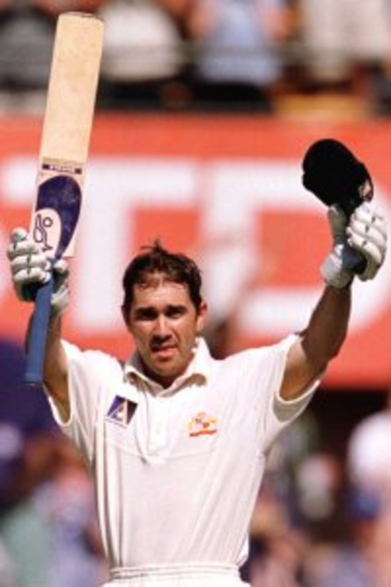 3 Jan 2000: Justin Langer of Australia celebrates his century against India during the second days play of the Third Test Match between Australia and India at the Sydney Cricket Ground, Sydney, Australia.