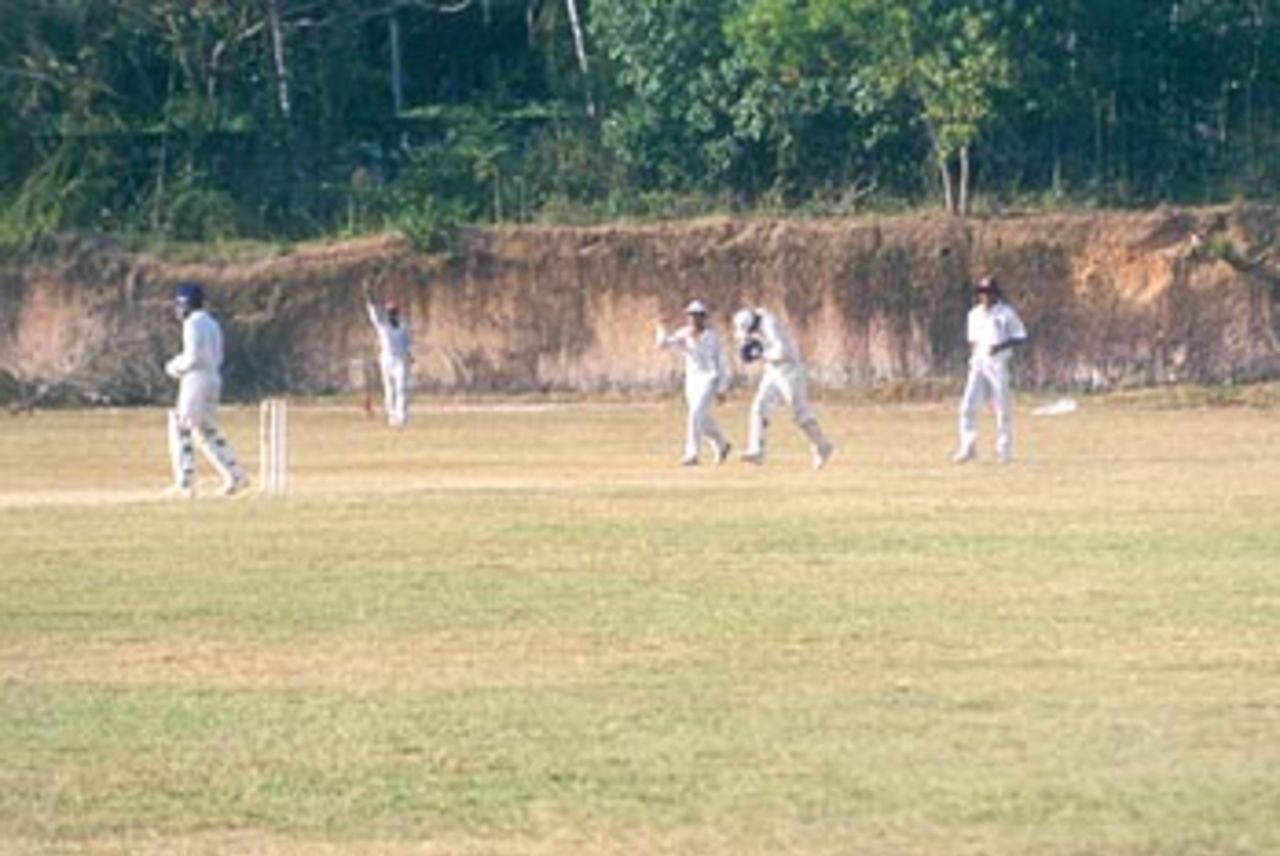 Wicketkeeper Dharmender Phagna celebrates as after taking a simple catch to dismiss Nileshkumar Rathod, Vijay Merchant Trophy 1999/2000, 2nd Pre Quarter Final, Baroda Under-16s v Haryana Under-16s atLakshmibai National College of Physical Education Ground, Thiruvananthapuram, 01-03 Jan 2000