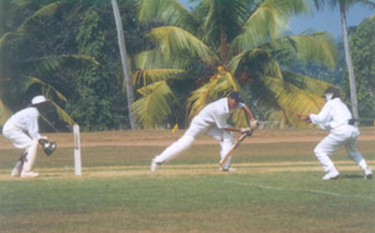 Ayan Nandi offers a simple catch to Vishal Kudawala at silly point, Vijay Merchant Trophy 1999/2000, 1st Pre Quarter Final, Bengal Under-16s v Tamil adu Under-16s at Vellyani Agricultural College Ground, Thiruvananthapuram, 01-03 Jan 2000