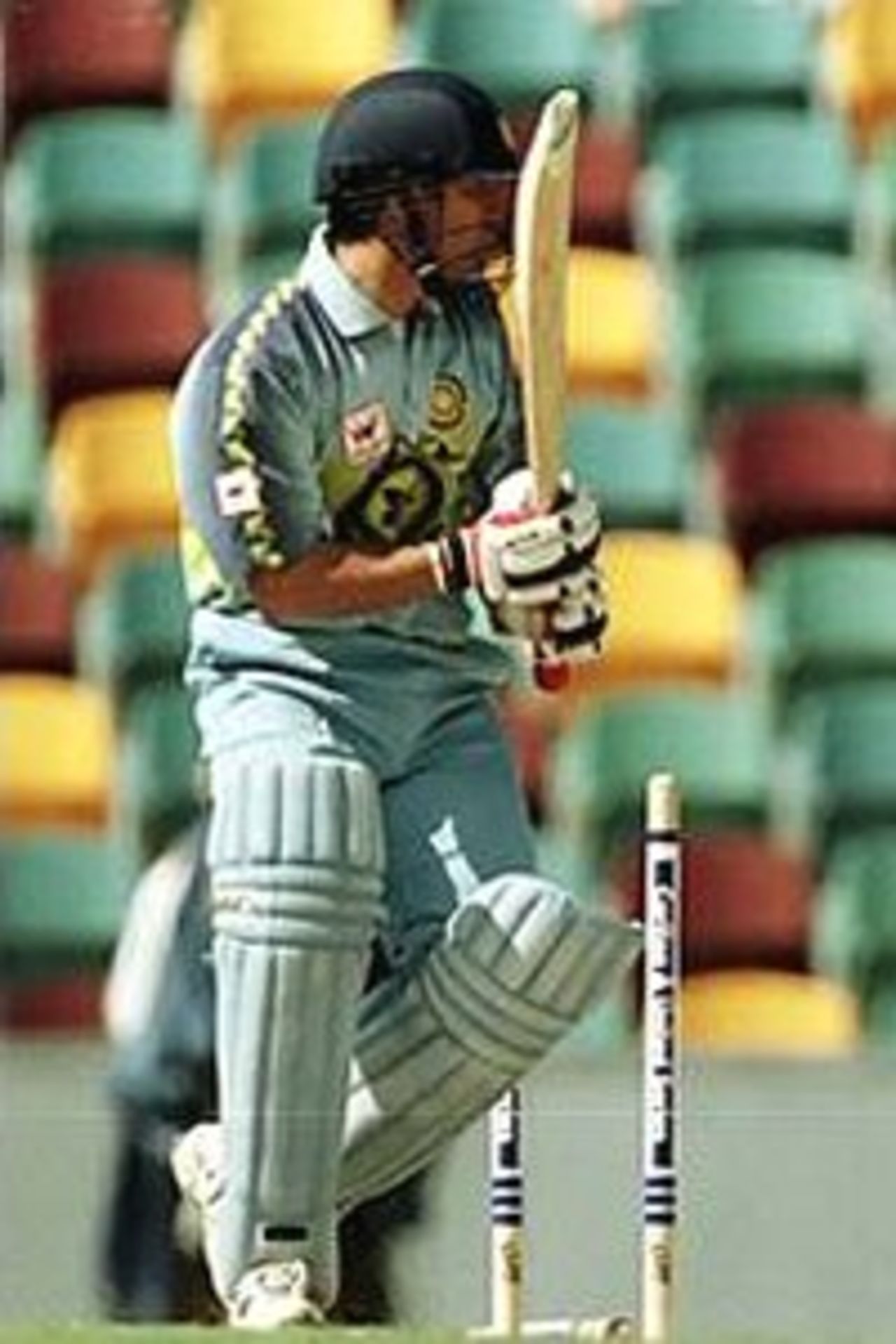 10 Jan 2000: India captain Sachin Tendulkar is bowled by Abdur Razzaq of Pakistan for 13 during the Carlton and United One Day International between India and Pakistan at The Gabba, Brisbane, Australia.