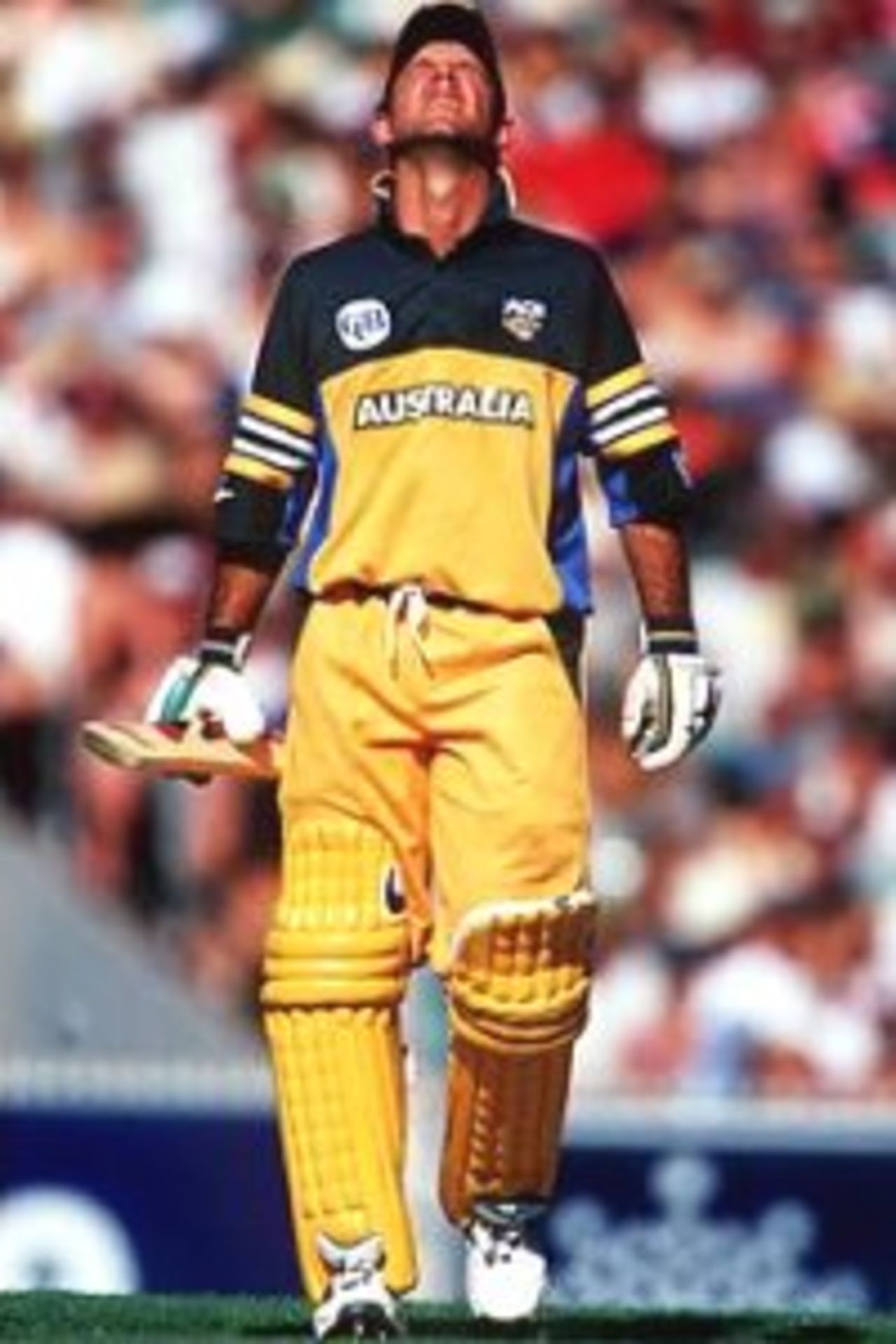 ~12 Jan 2000: Ricky Ponting of Australia shows the strain of a long innings in the heat during the Carlton and United Series match between Australia and India, played at the Melbourne Cricket Ground, Melbourne, Australia. Ponting went on to make 115 runs.